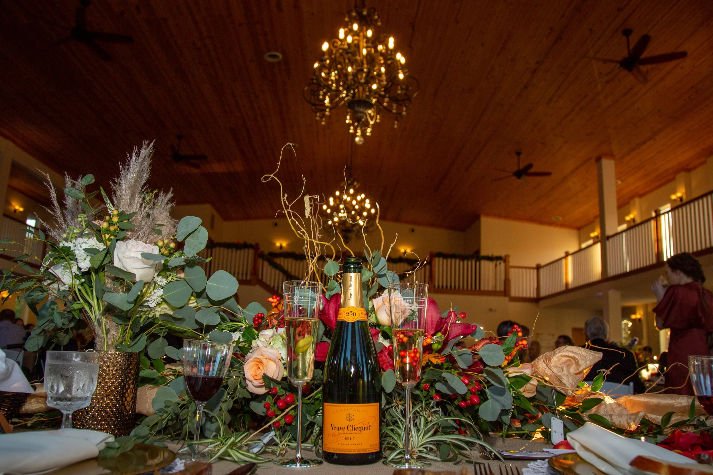 This is a scenic boho elegant rustic view of the inside of the award-winning reception hall outdoor mansion wedding venue Rosewood Manor in Miamisburg at Magnolia Estate. Surrounded by the Greater Dayton, Columbus, and Cincinnati areas. 