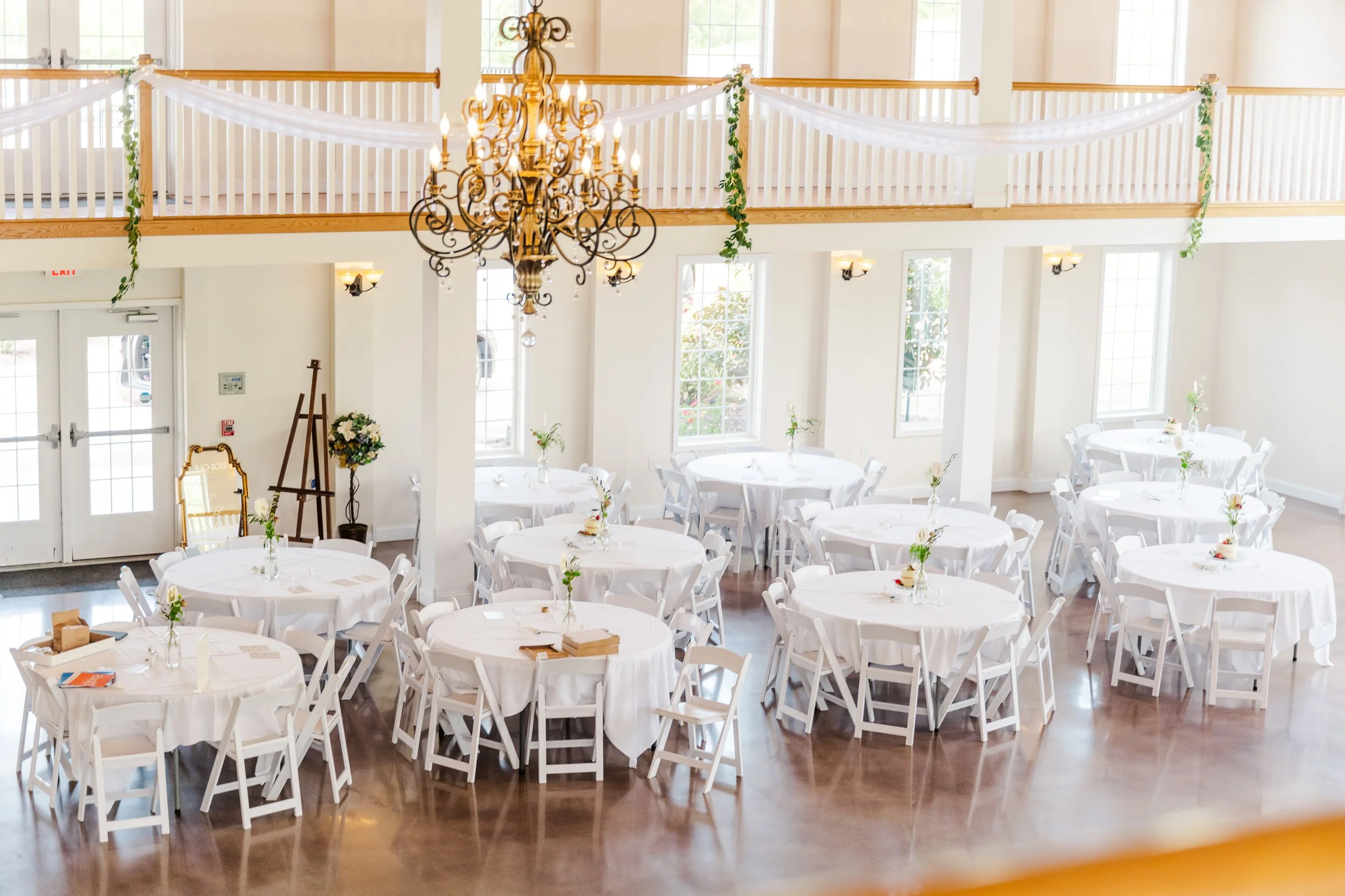 This is a scenic boho elegant rustic view of the inside of the award-winning reception hall outdoor mansion wedding venue Rosewood Manor in Miamisburg at Magnolia Estate. Surrounded by the Greater Dayton, Columbus, and Cincinnati areas. 
