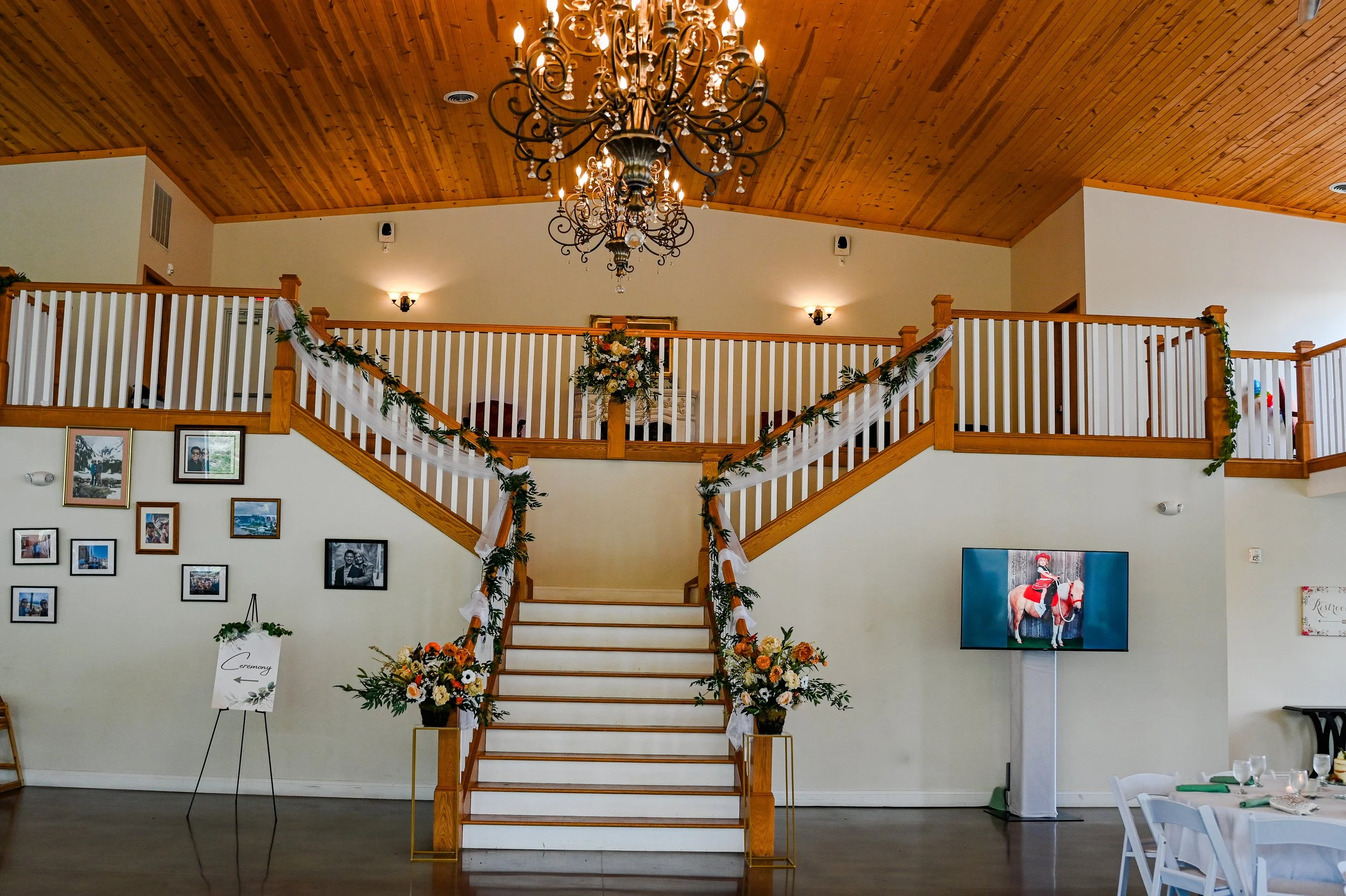 This is a scenic boho elegant rustic view of the inside of the award-winning reception hall outdoor mansion wedding venue Rosewood Manor in Miamisburg at Magnolia Estate. Surrounded by the Greater Dayton, Columbus, and Cincinnati areas. 