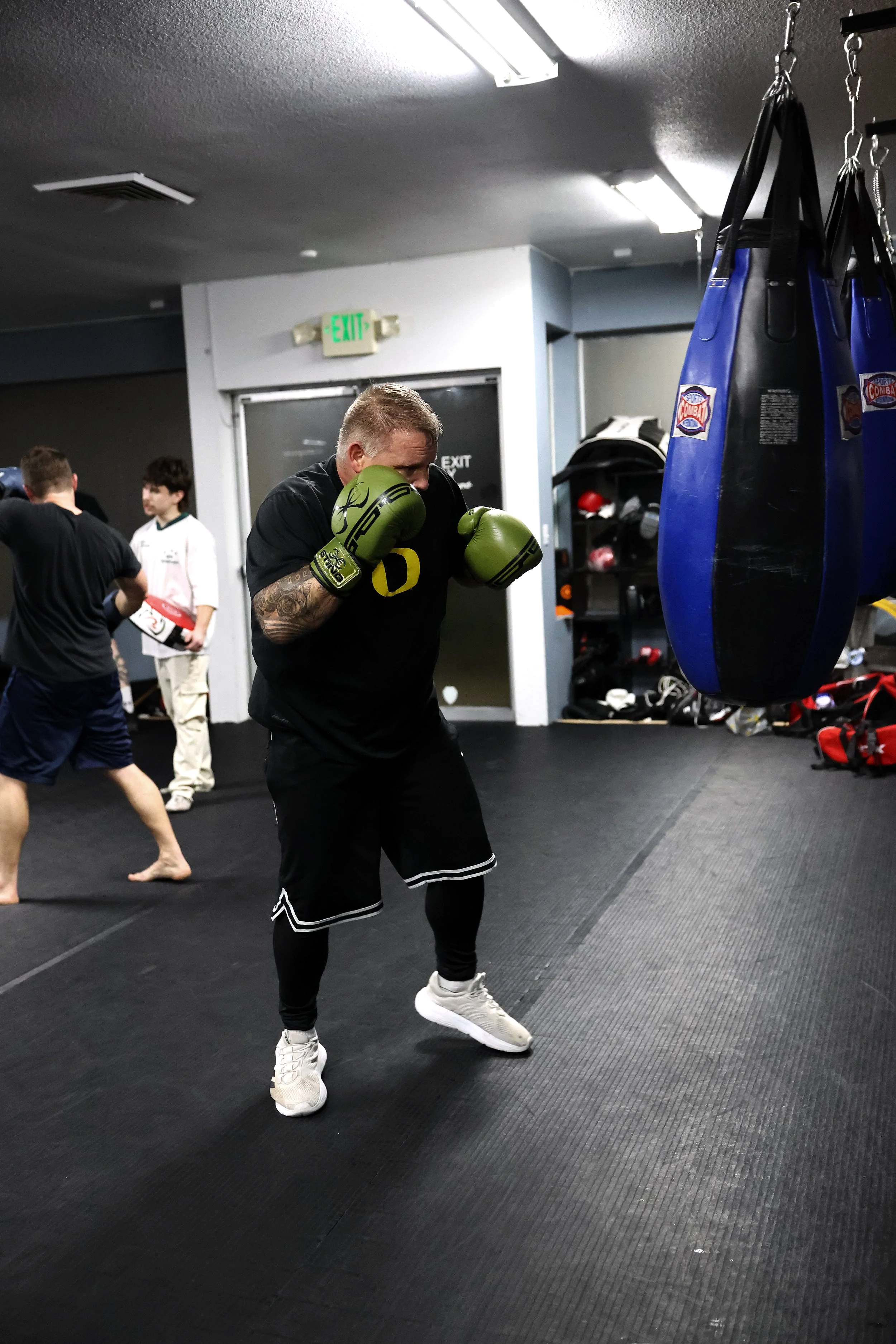 Group of children and teens in boxing class