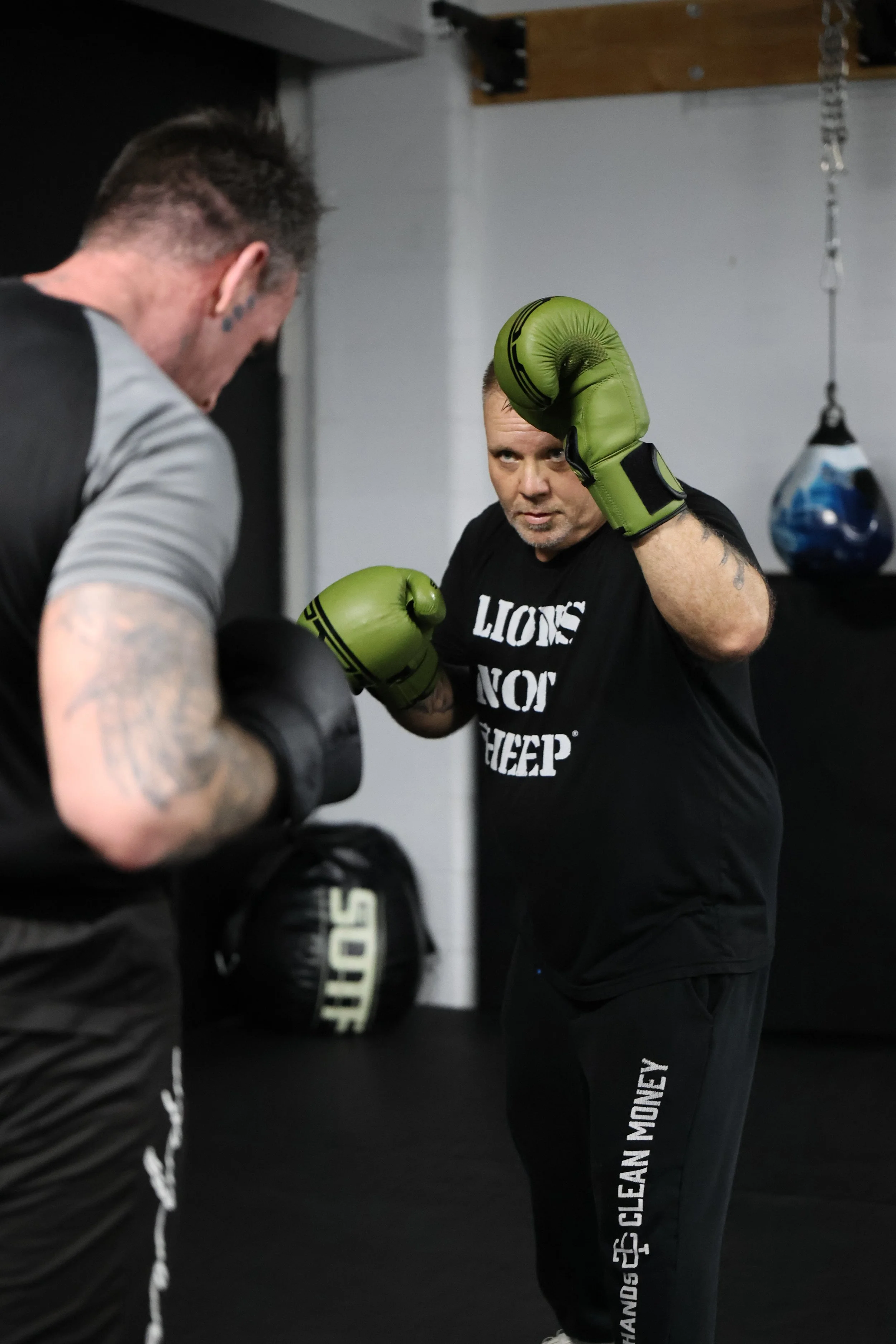 Group of children and teens in boxing class