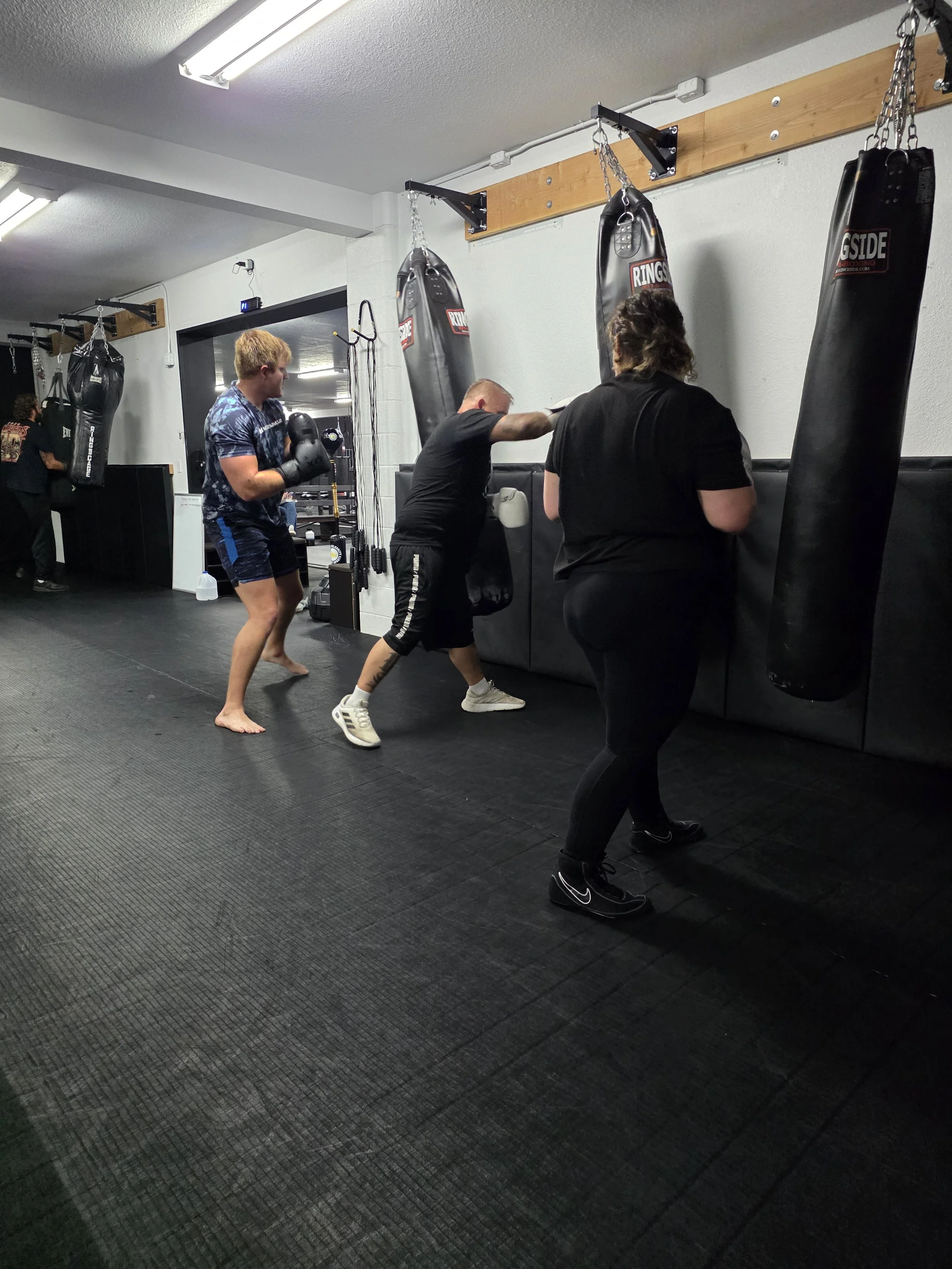 Group of children and teens in boxing class
