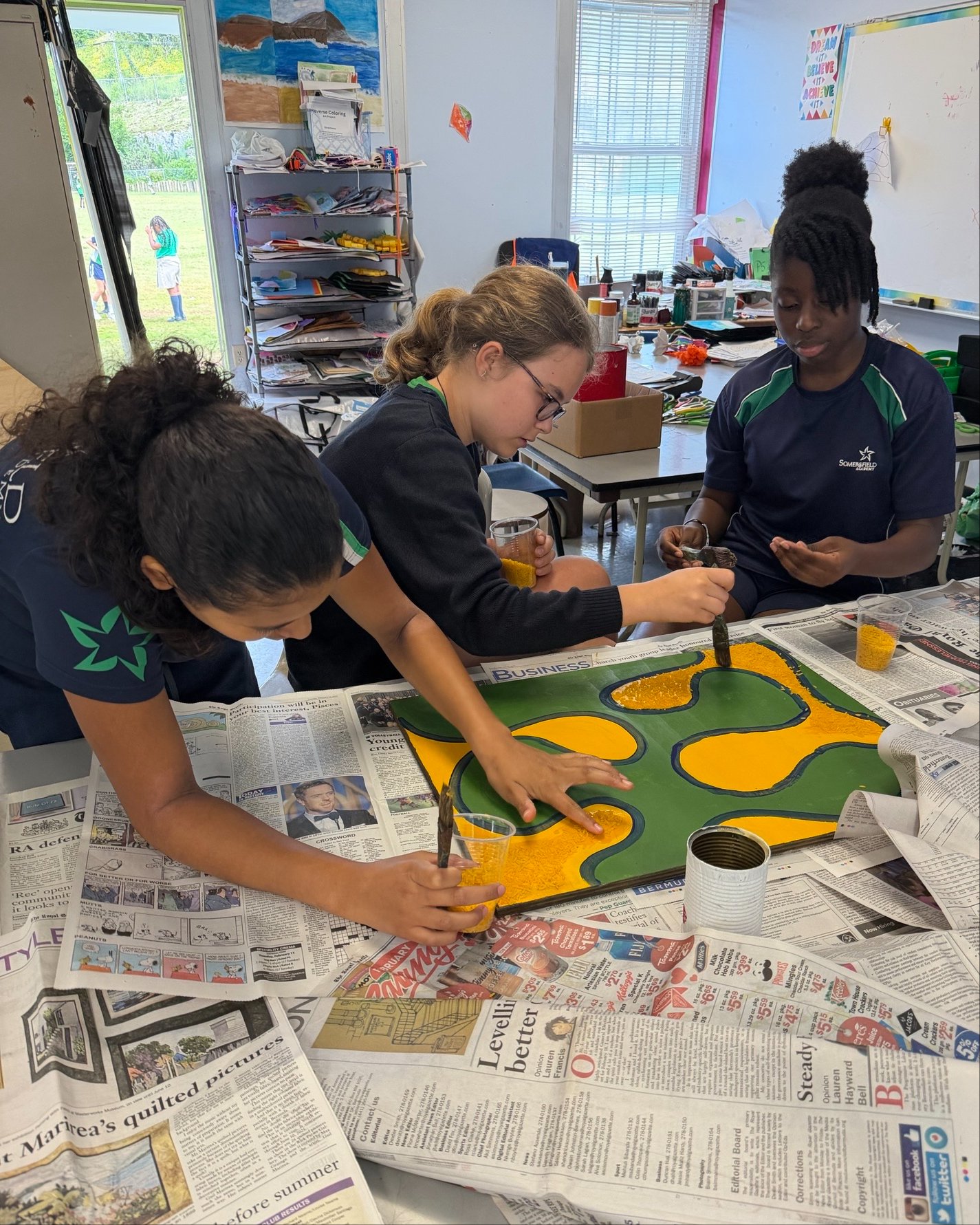 Students, staff, and parents have been busy painting, gluing down coloured rice, making paper flowers, and adding all the little details that are bringing the Somersfield Bermuda Day float to life.

There&rsquo;s still more to do, but it&rsquo;s exci