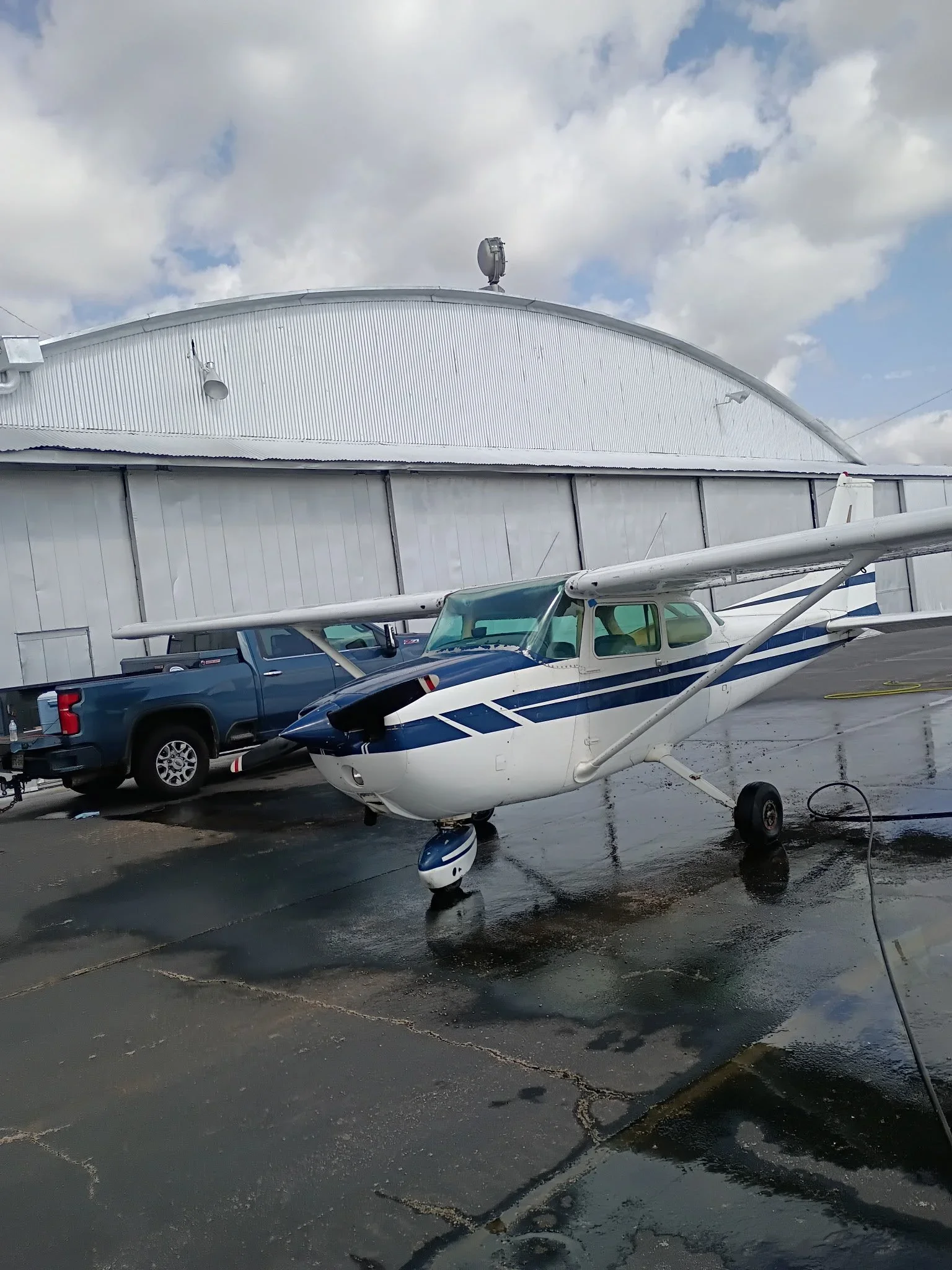 Small aircraft receiving professional exterior washing and cleaning