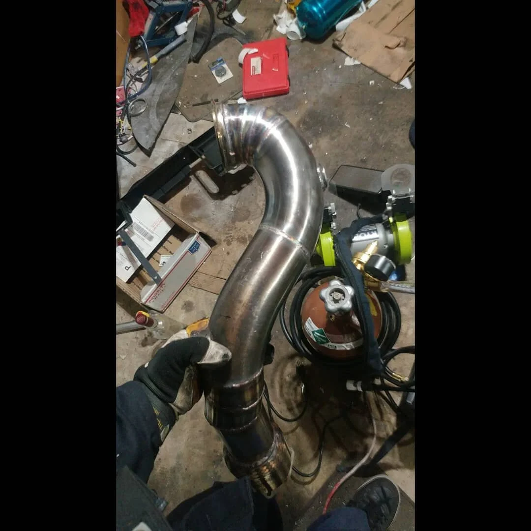 Trying to get more into auto again. Custom downpipe, wastegate dump tube, and intercooler piping done a few weeks ago for @audi_mike vr6 turbo car🤙 Happy to be part of this project!  #vr6t #vw #welding #tig #fabrication #piecuts #intercoolerpiping #