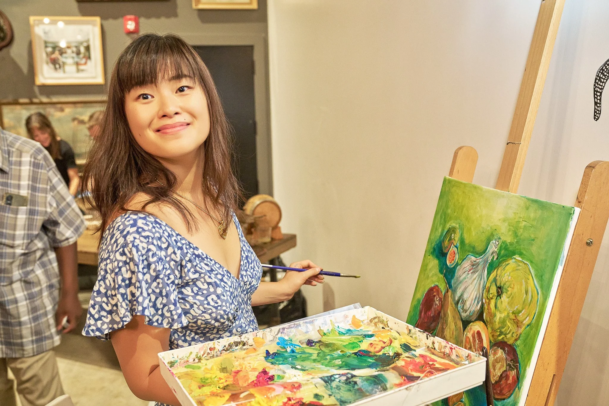 Emma Peters doing a live painting at Food Forward's Tomorrow's Table gala