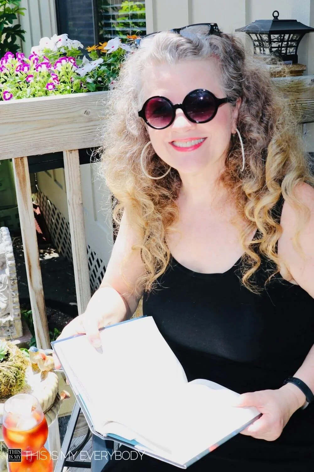 What Book Should I Read Quiz (Denise reading on outdoor deck)