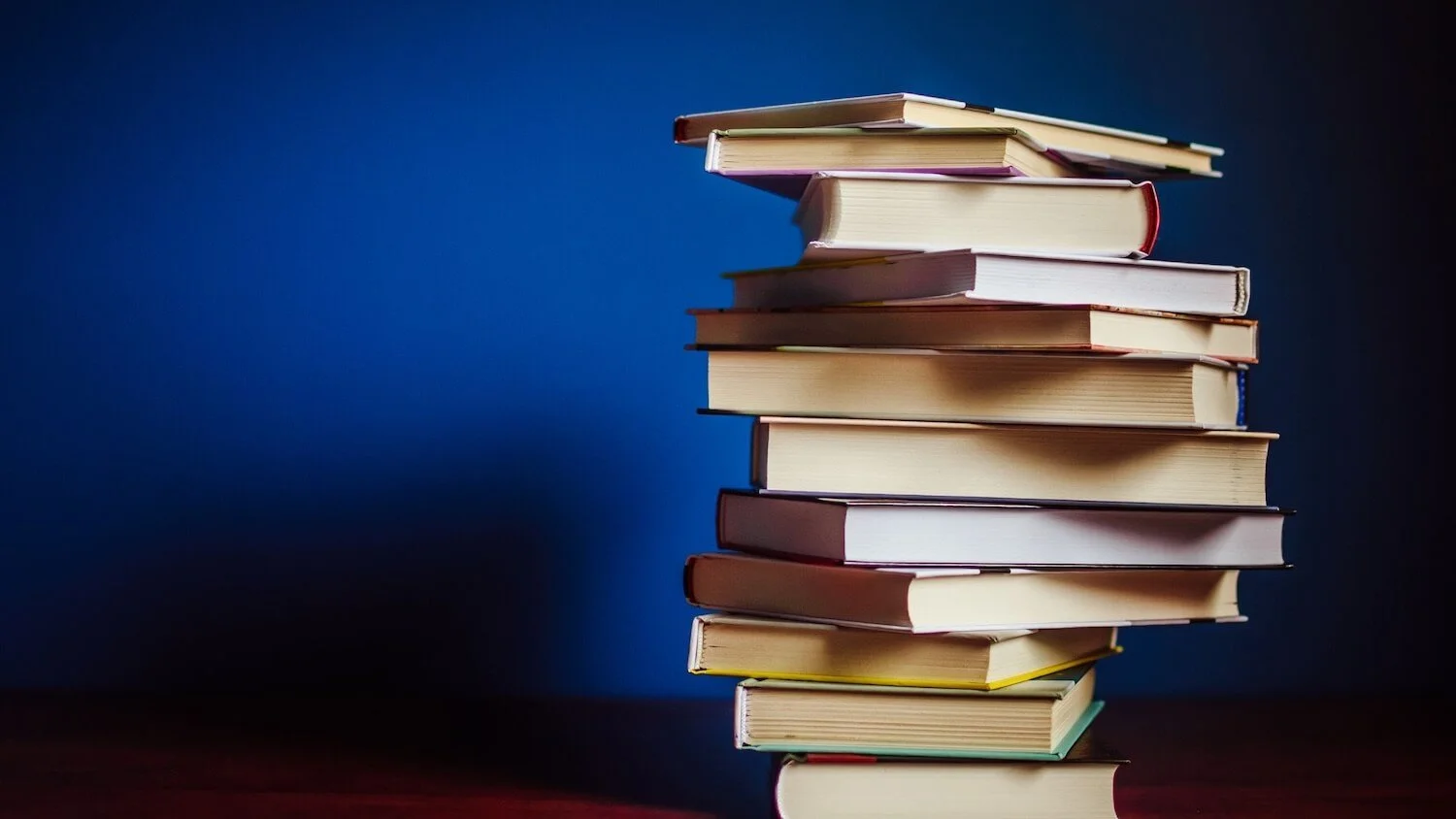 2026 Simple Home Favorites (Stack of books on blue background)