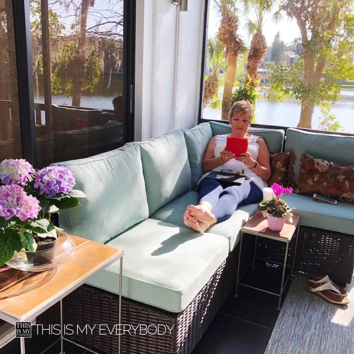 What Book Should I Read Quiz (Woman reading on sofa on outdoor porch)