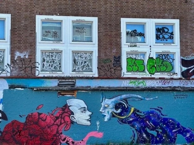 NDSM graffiti - fantasy creatures with masks.jpg