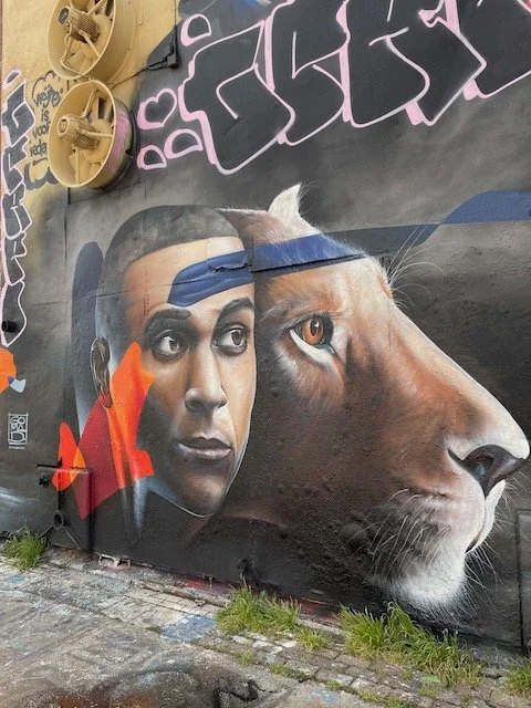 NDSM graffiti - man with lion.jpeg