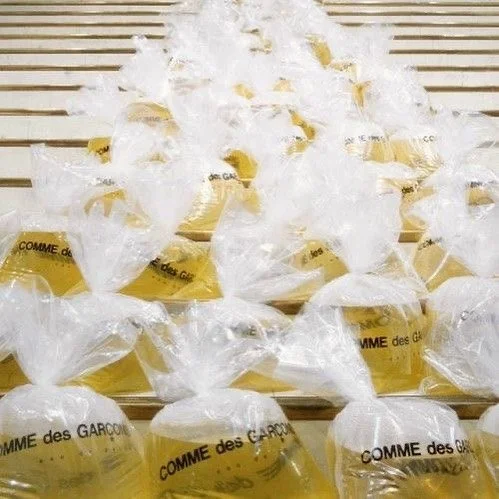 Rei Kawakubo appears and offers you a glass. WWYD?