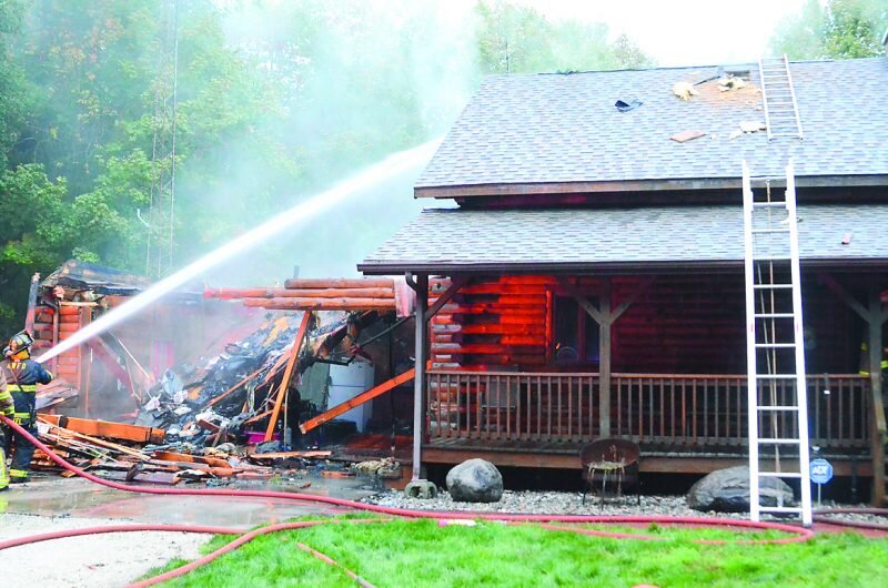 Lightning starts fire in log cabin home
