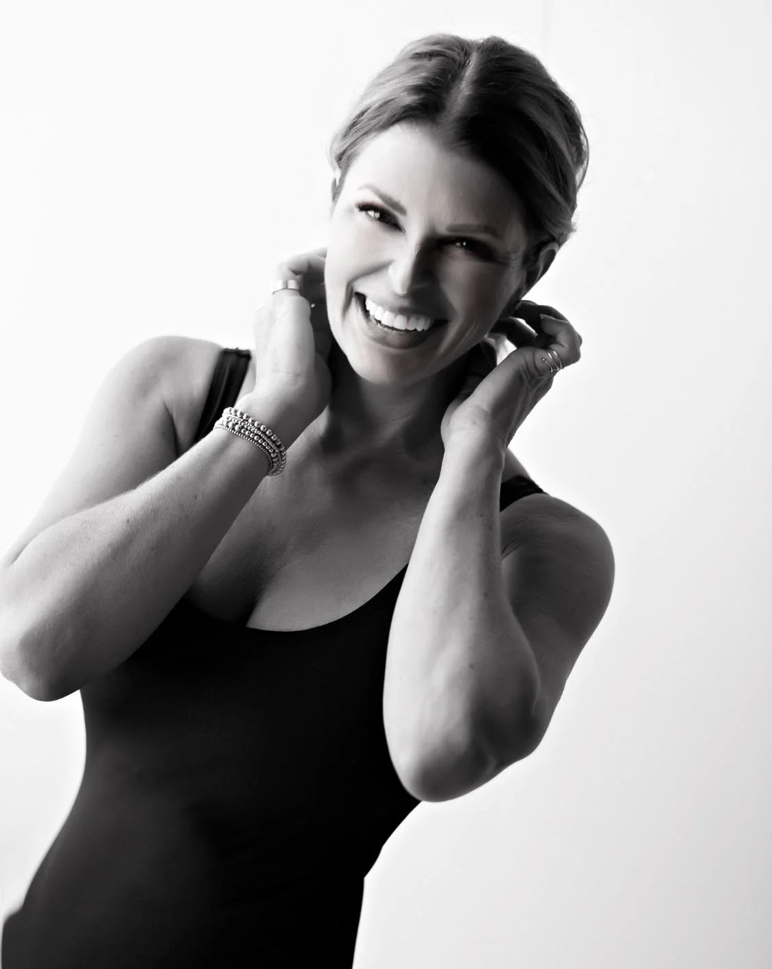 Black and white portrait of a smiling woman