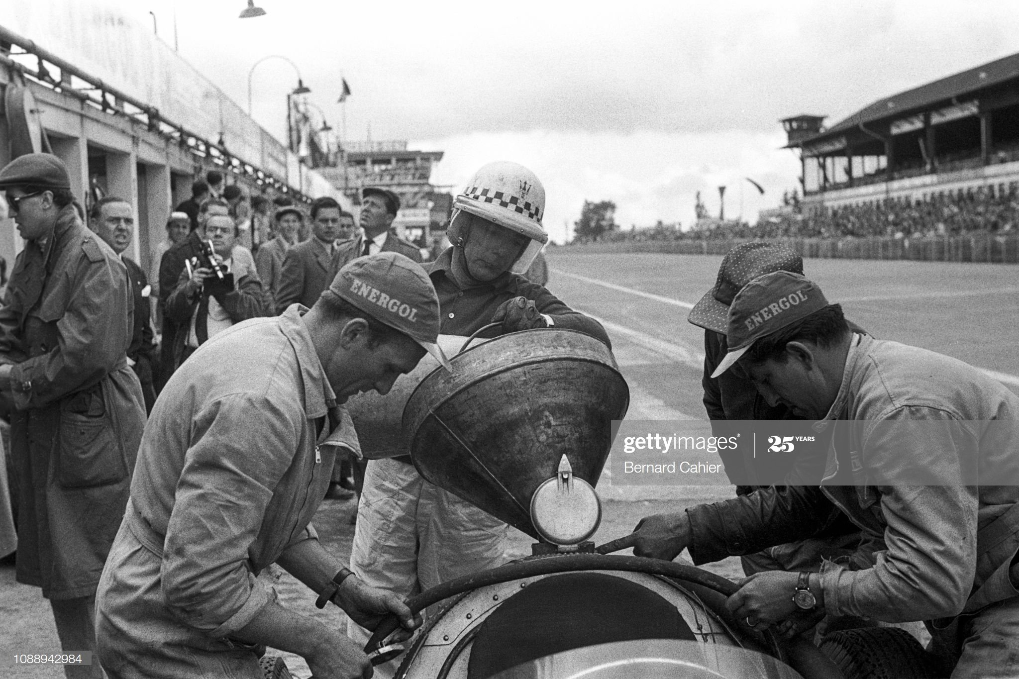 Driver Jean Behra in his F1 Maserati 250F at the Nurburgring, 05 August 1956