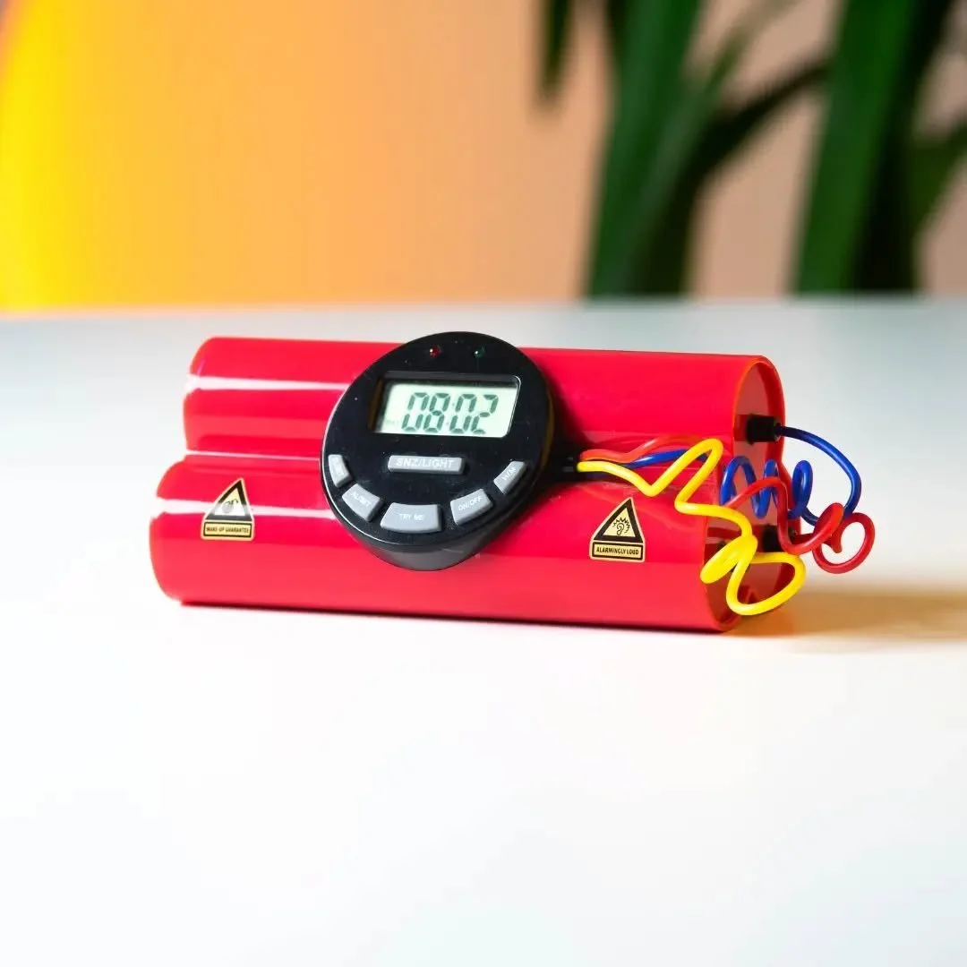 CLOCK DU TERRORISTE | 2000s

Tick, tick, BOOM! Meet the Clock du Terroriste, a wonderfully ridiculous bomb-shaped alarm clock straight from the golden age of millennium gadgets.

With its bright red dynamite sticks, colorful wires and digital display