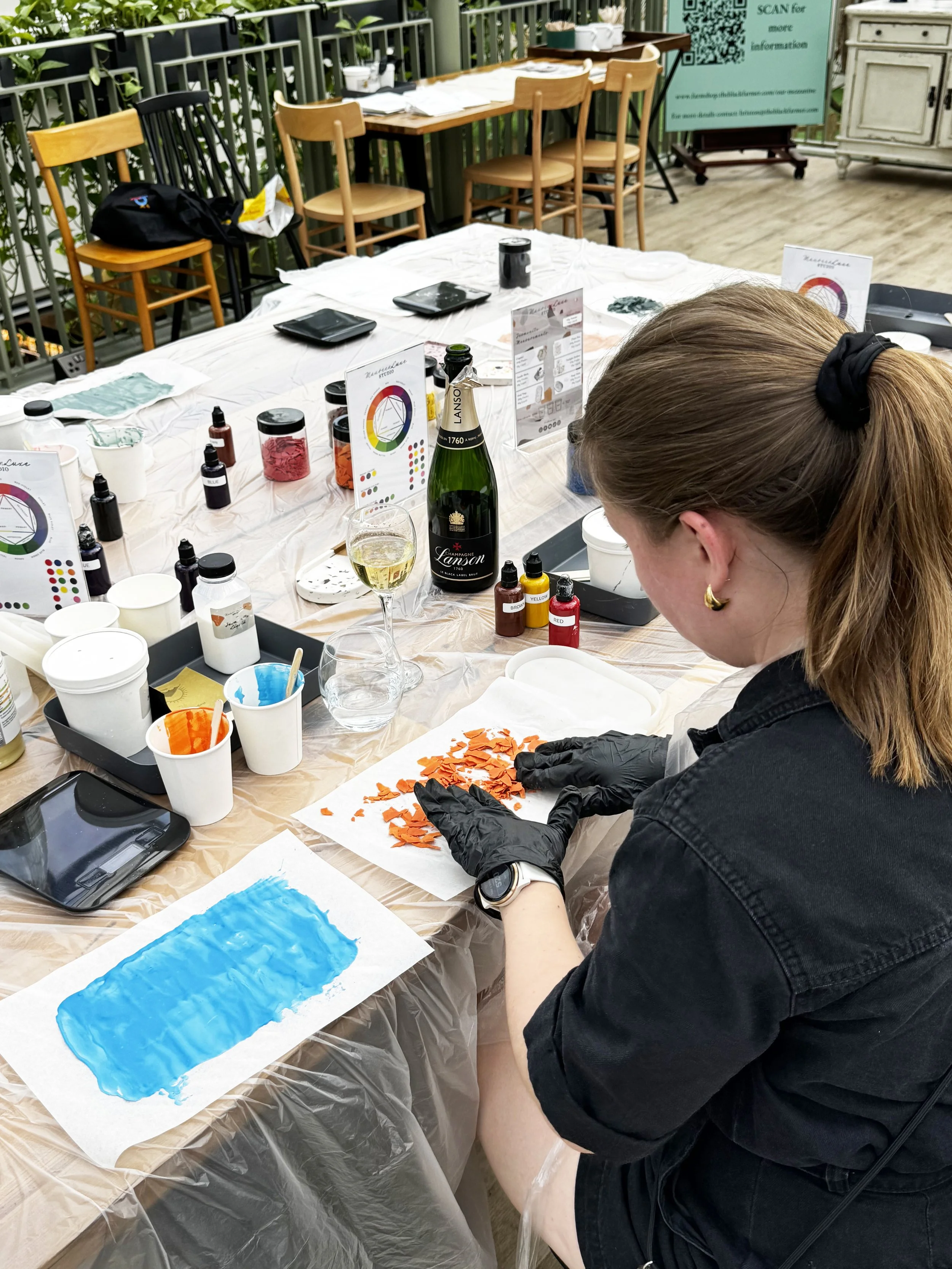 Participants crafting terrazzo coasters during a hands-on DIY workshop. (Copy)