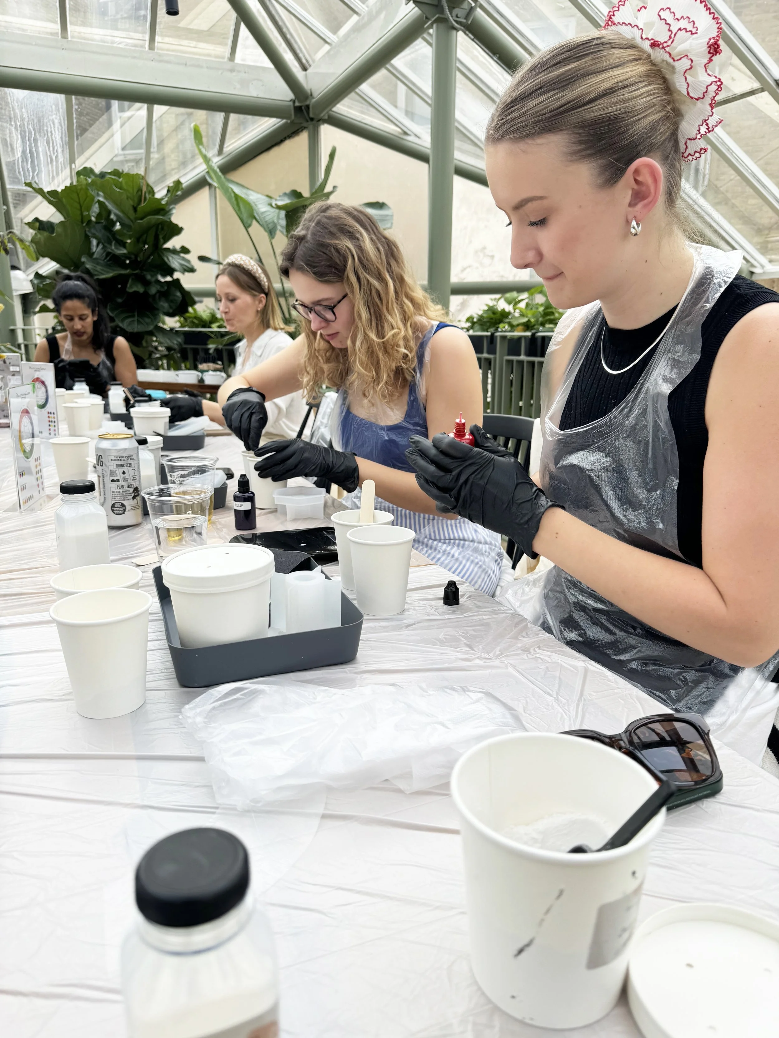 Participants crafting terrazzo coasters during a hands-on DIY workshop. (Copy)