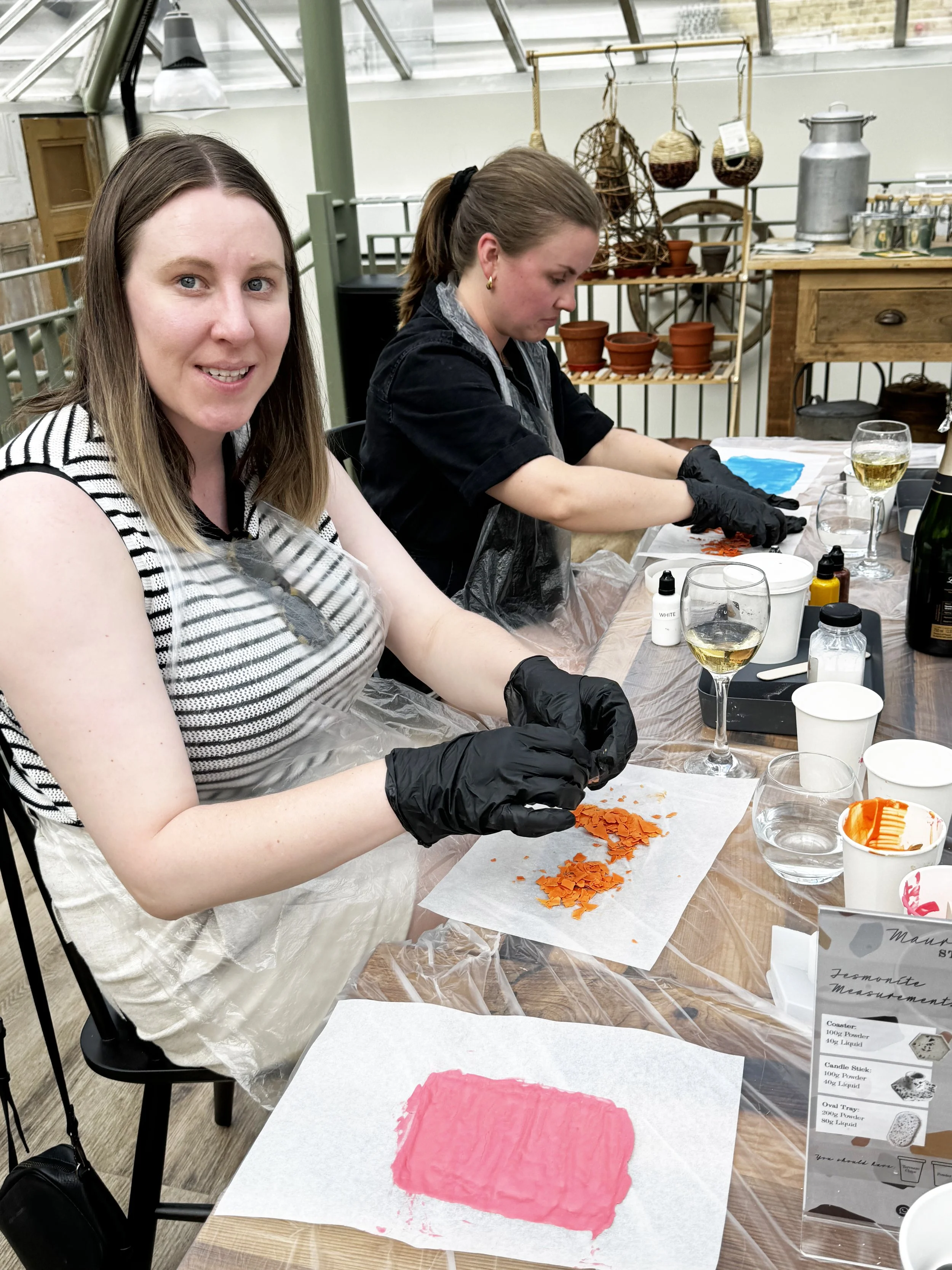 Participants crafting terrazzo coasters during a hands-on DIY workshop. (Copy)