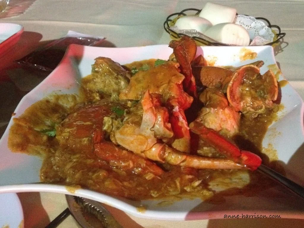 A white plate with chilli mud crab
