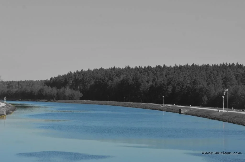 A black and white photo of the Danube, with the water coloured blue