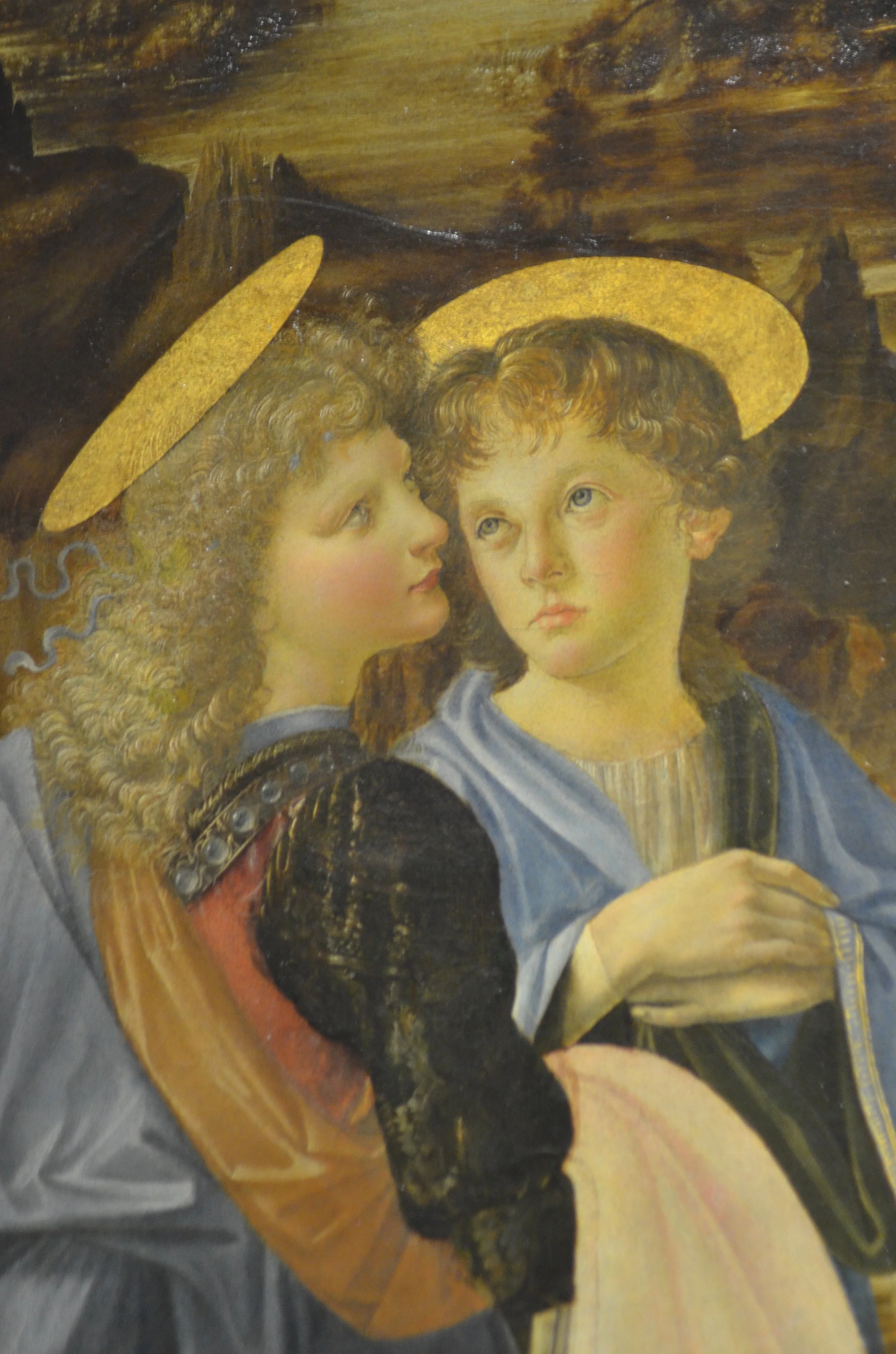 Details of Veroochio's The BAptisim of John the BAptist, showing the angel painted by Leonardo da Vinci.