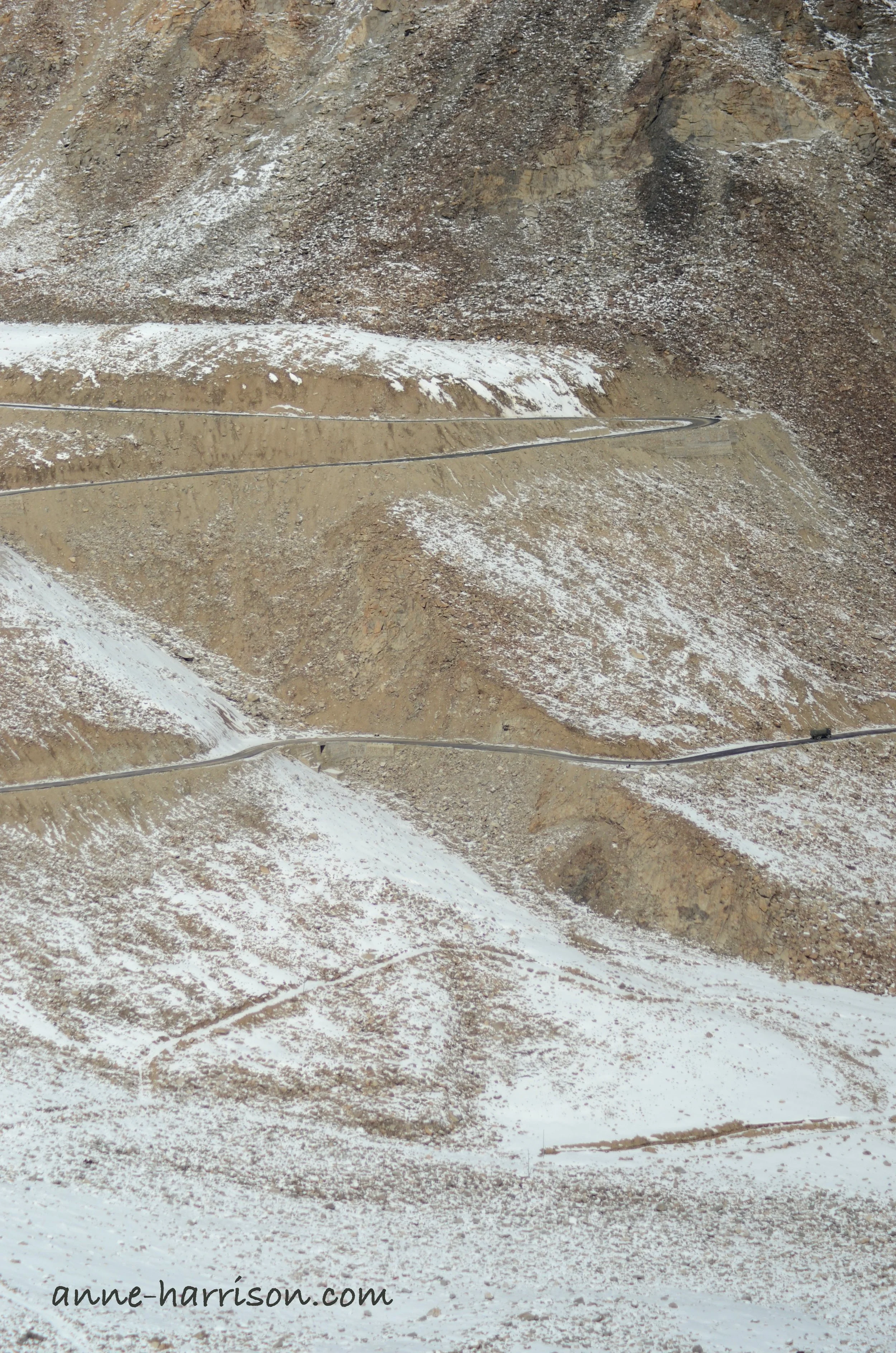 A truck dwarfed by the mountans © A. Harrison
