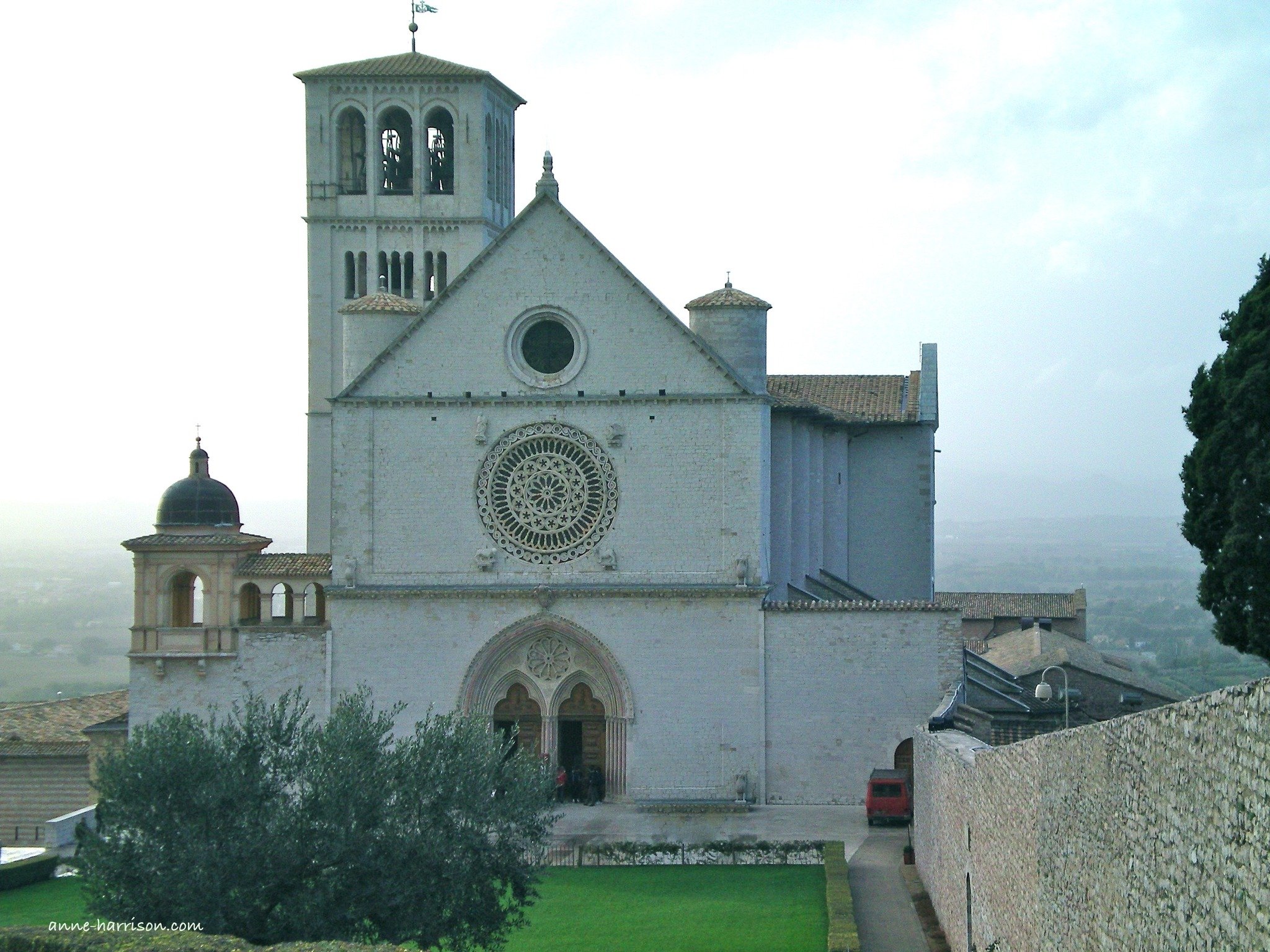 A storm sweeping in towards the upper entrance to the Basilica of St Francis in Assisi. Whereas the main entrance is often a scrum of tourists seeking enlightenment in a few hours, entering the Basilica through this entrance is incredibly peaceful - 