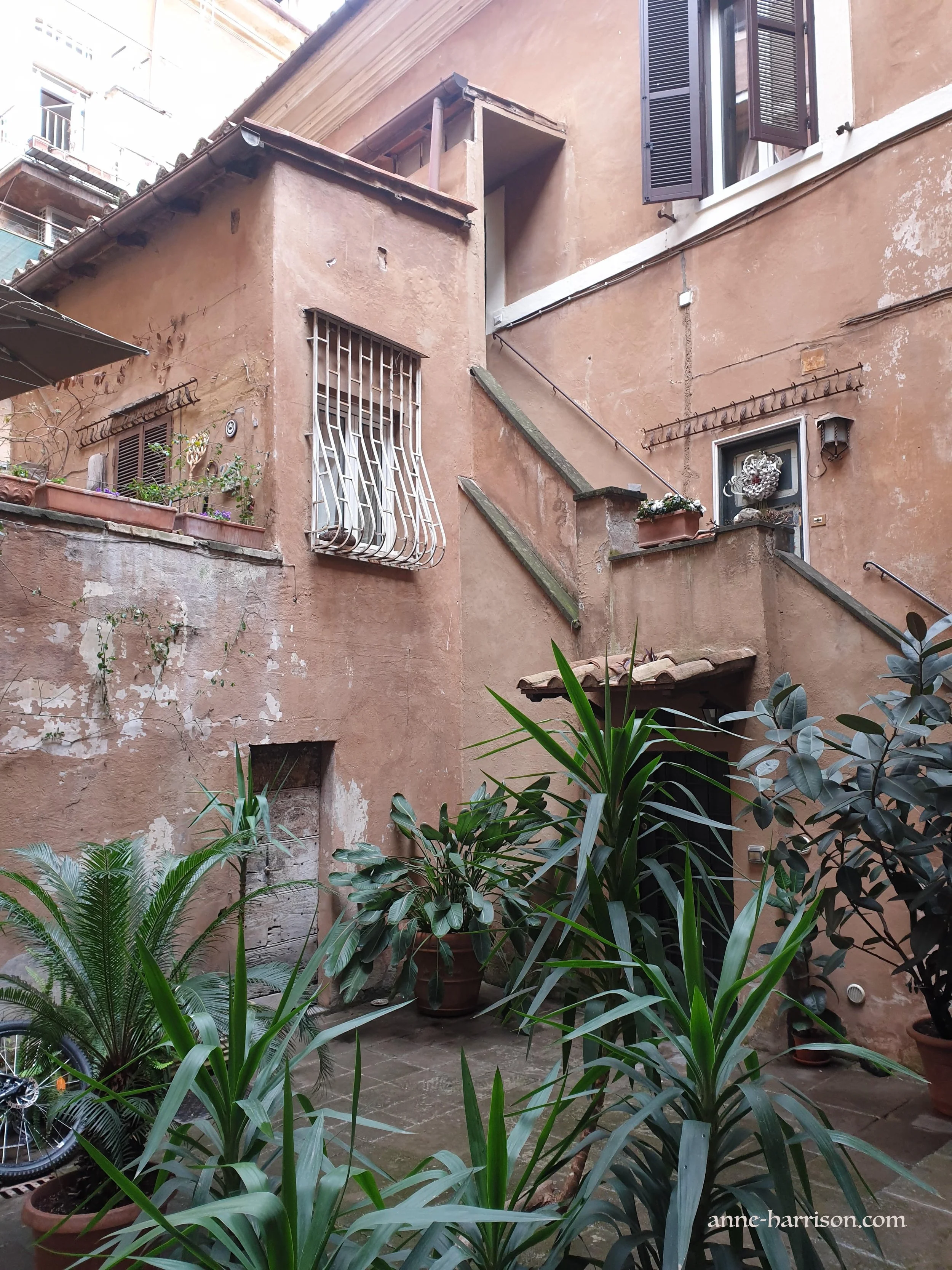Courtyard and outdoor stairs in a Roman building © A. Harrison