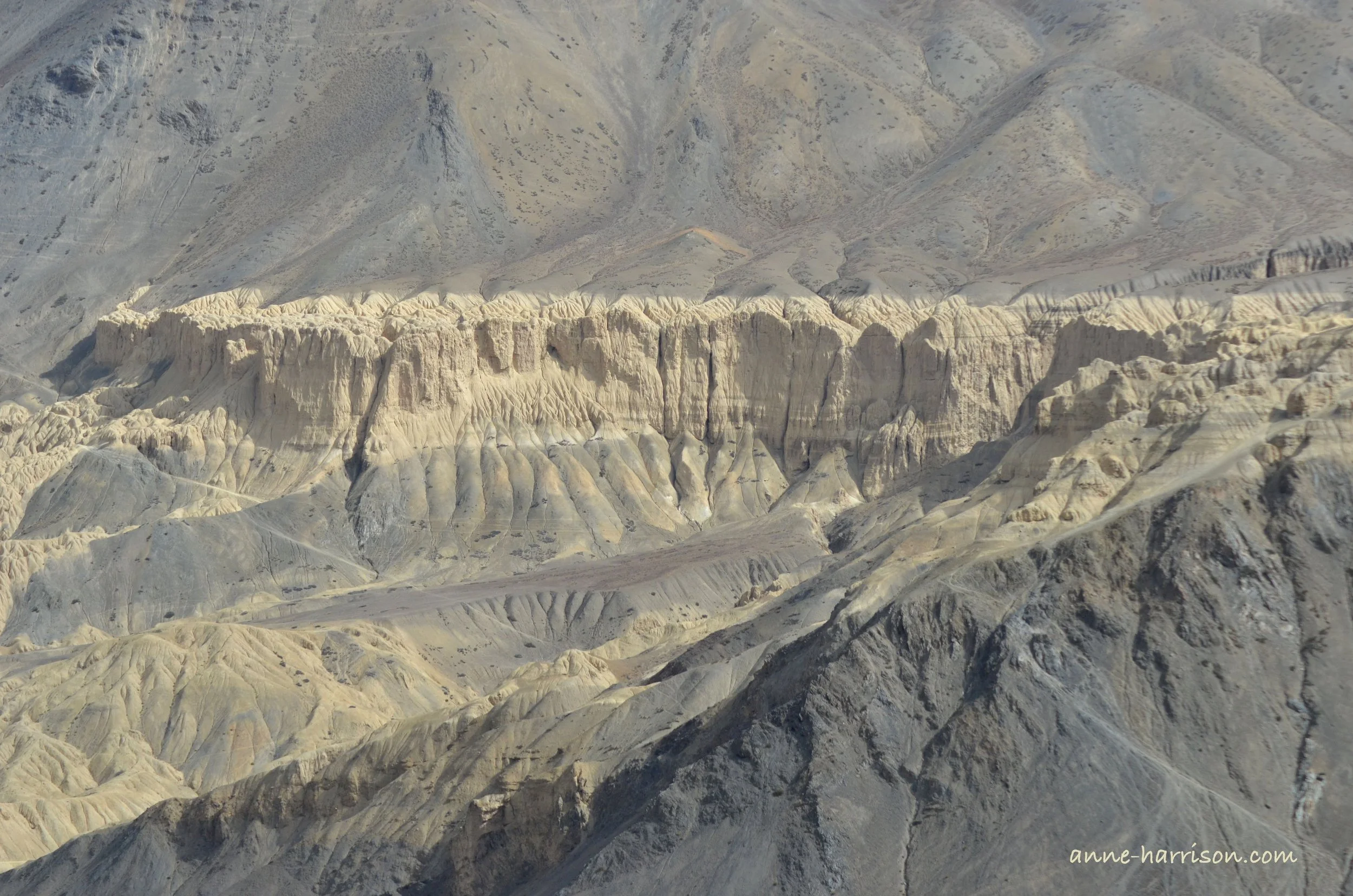 Desert mountains with tracks made by animals