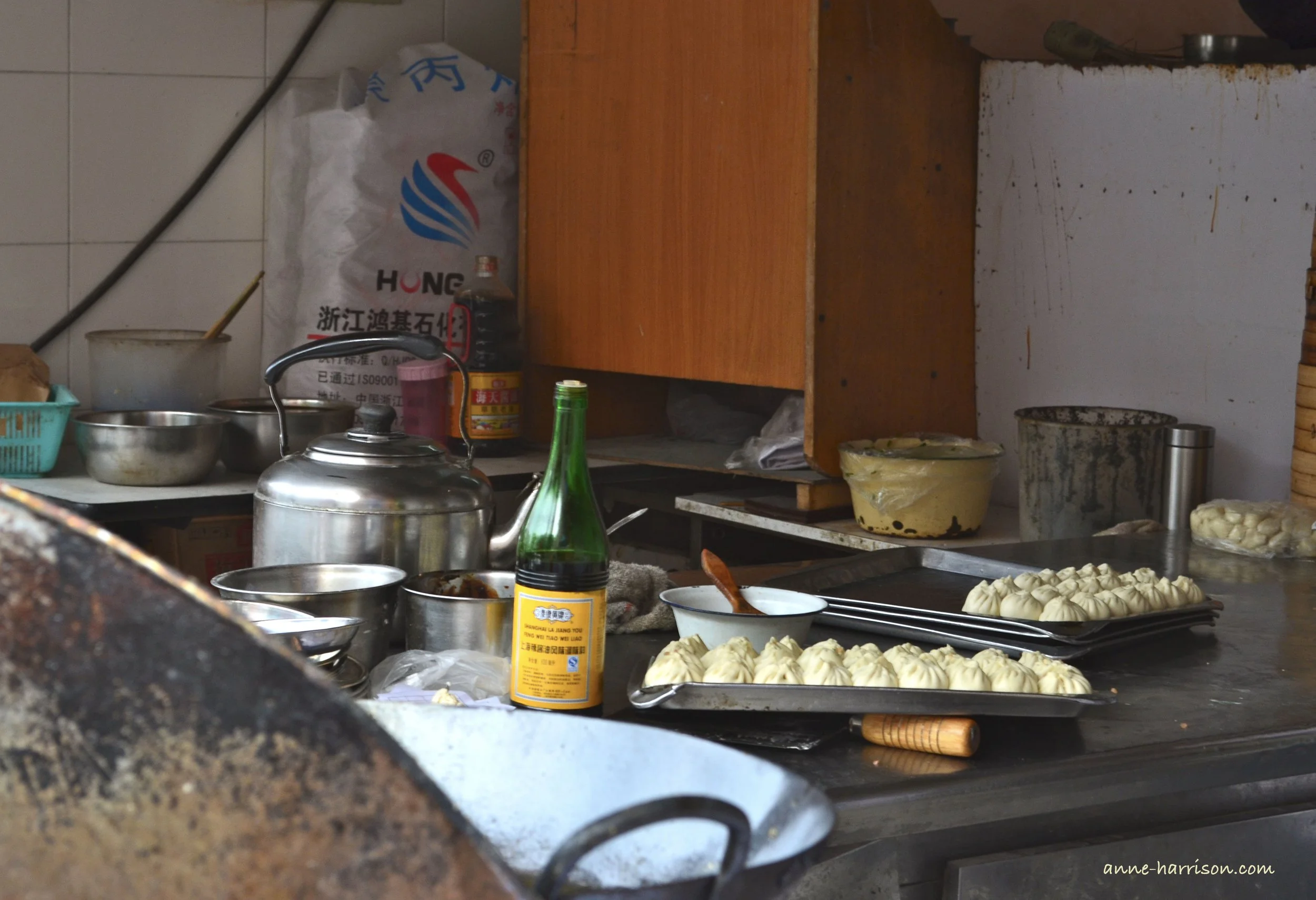 Dumplings waiting to be be cooked in an outdoor kitchen