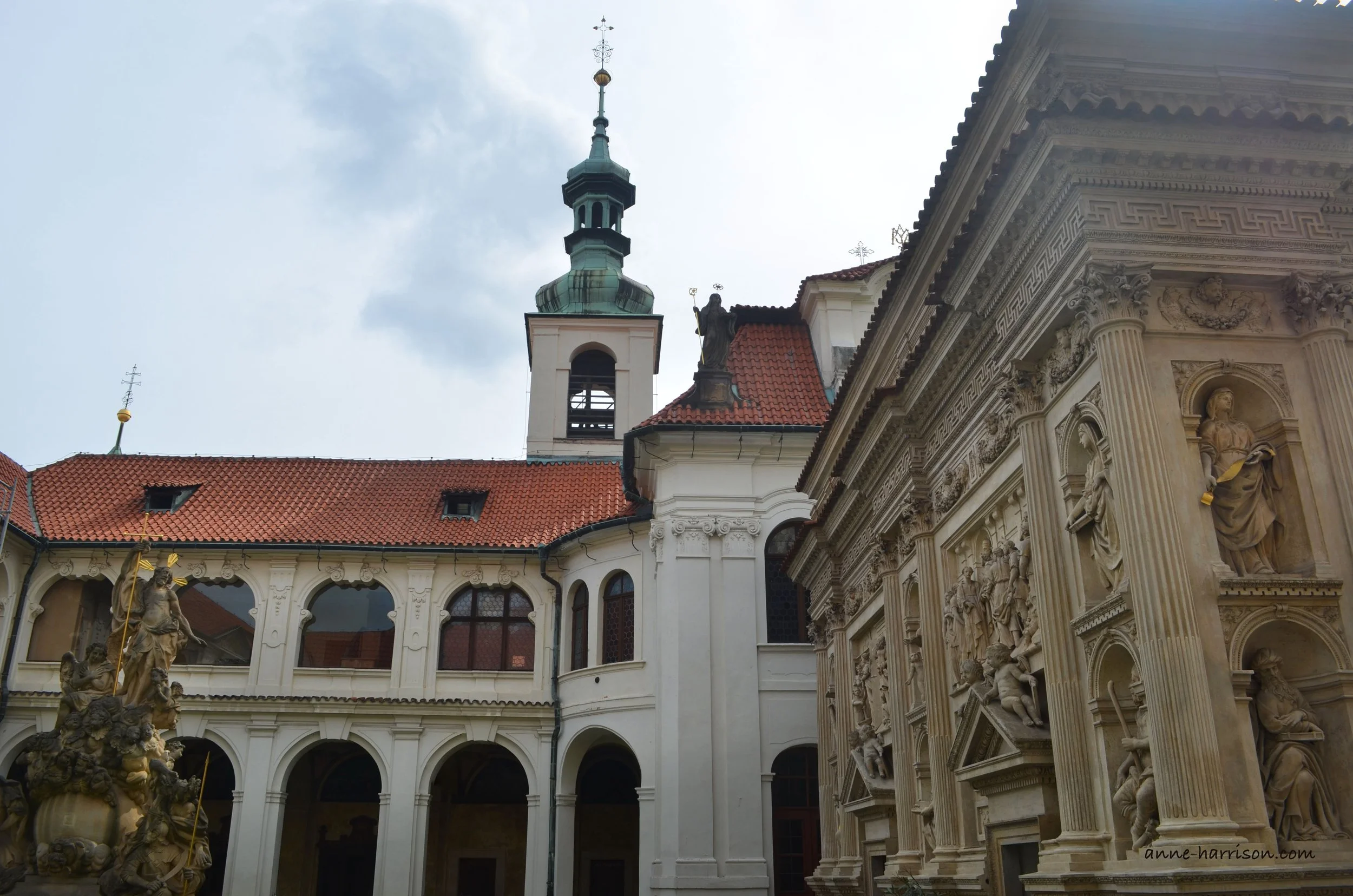 The Casa Santa with carvings on the walls, plus the white Loreto convent