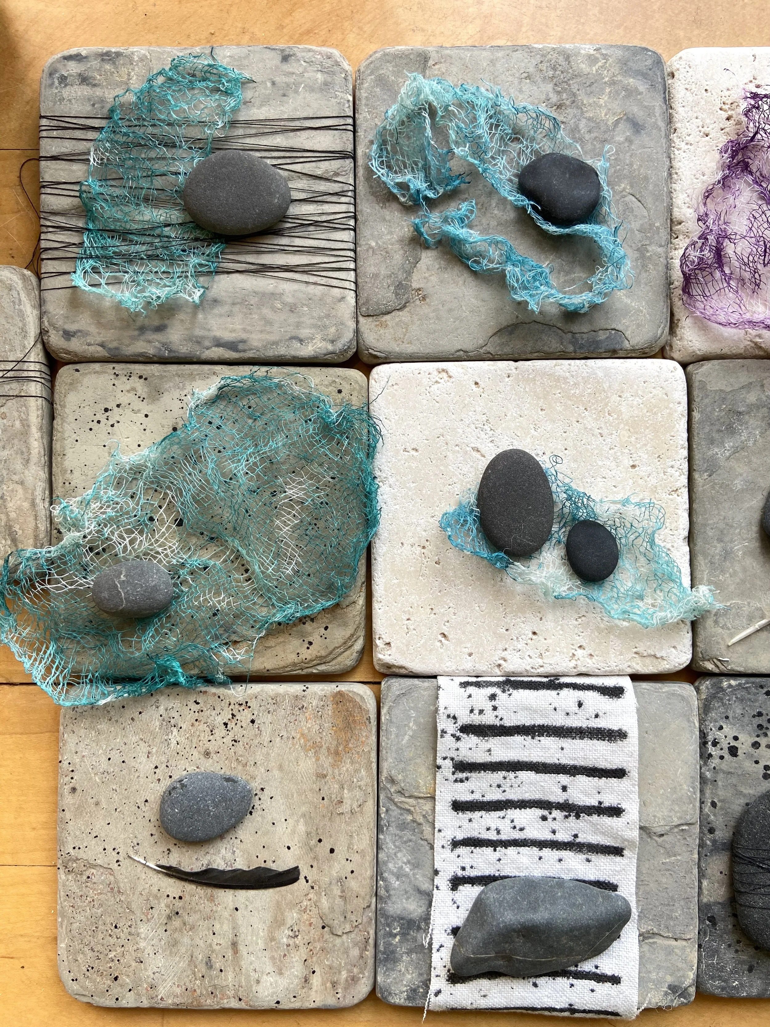 Zen contemplative assemblages of stone, painted linen cloth, gathered stones, dyed cheesecloth, found feathers, nature connected art, meditative art, contemplative art, peaceful art, mixed media artist in Wisconsin, Emma Freeman Art, textile artist, 
