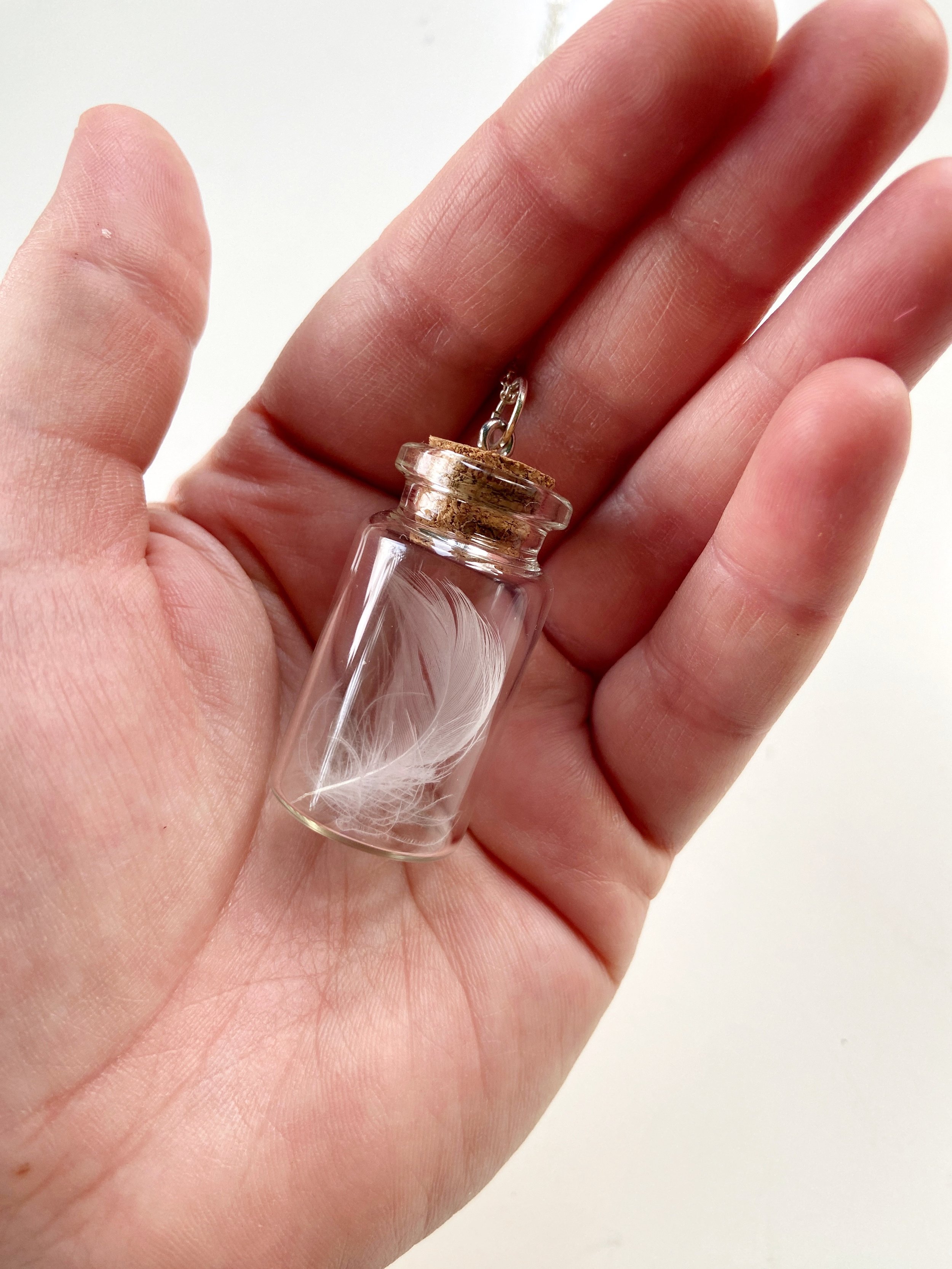White Feather Necklace.jpeg