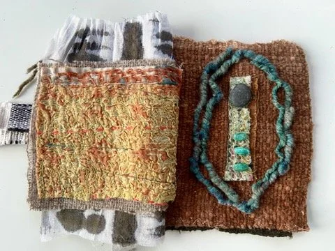 Rustic, contemplative mixed media textile books made by mixed media artist, Emma Freeman using vintage global textiles including mud cloth from Mali in Africa, batik fabric from India, vintage kantha cloth from India, wool yarn from a Peruvian frazad