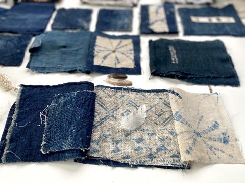 Rustic, wabi sabi, contemplative mixed media textile books made by mixed media artist, Emma Freeman using vintage global textiles including mud cloth from Mali in Africa, batik fabric from India, vintage kantha cloth from India, wool yarn from a Peru
