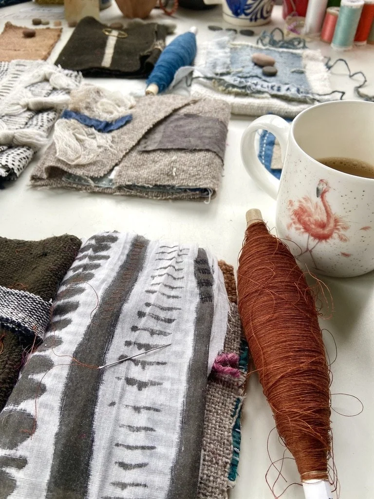Rustic, contemplative mixed media textile books made by mixed media artist, Emma Freeman using vintage global textiles including mud cloth from Mali in Africa, batik fabric from India, vintage kantha cloth from India, wool yarn from a Peruvian frazad