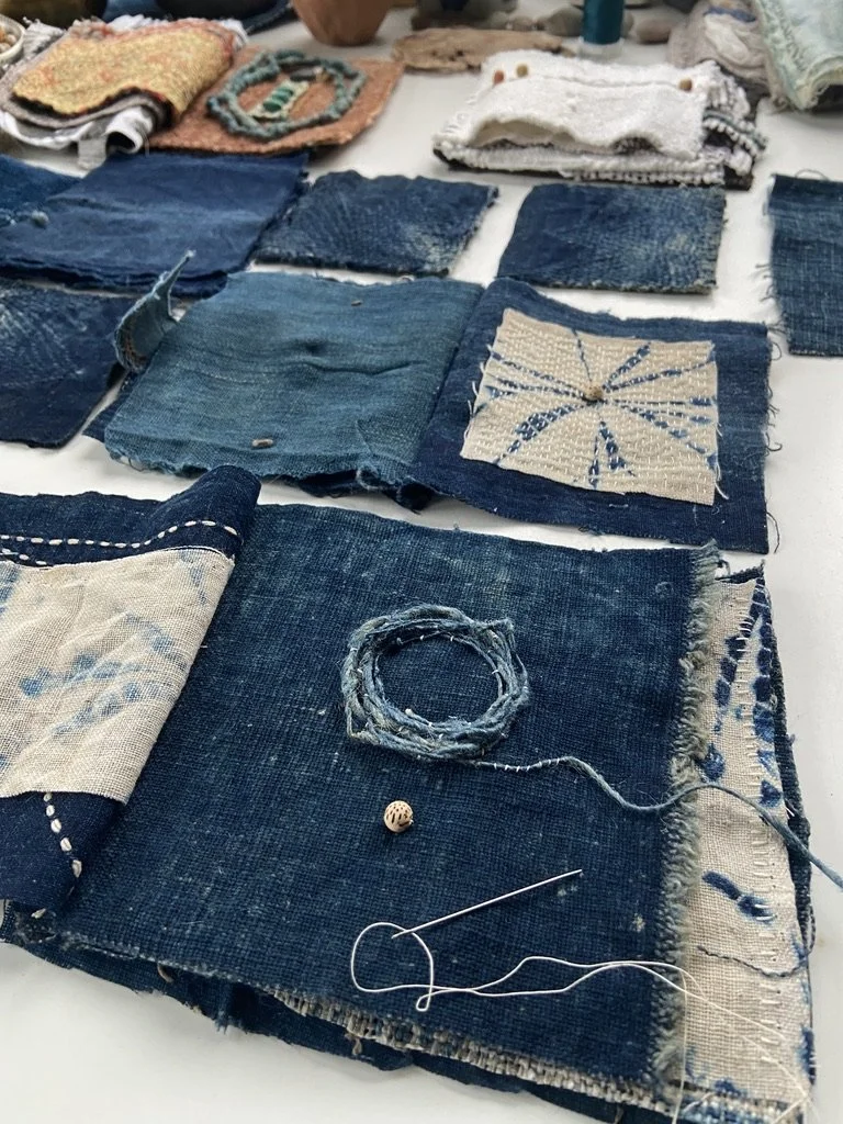 Rustic, wabi sabi mixed media textile books made by Emma Freeman using vintage textiles from Japan and China, naturally dyed fabrics, hand spun nettle yarn from India dyed with indigo, lotus seed meditation bead, and slow stitching by hand. 