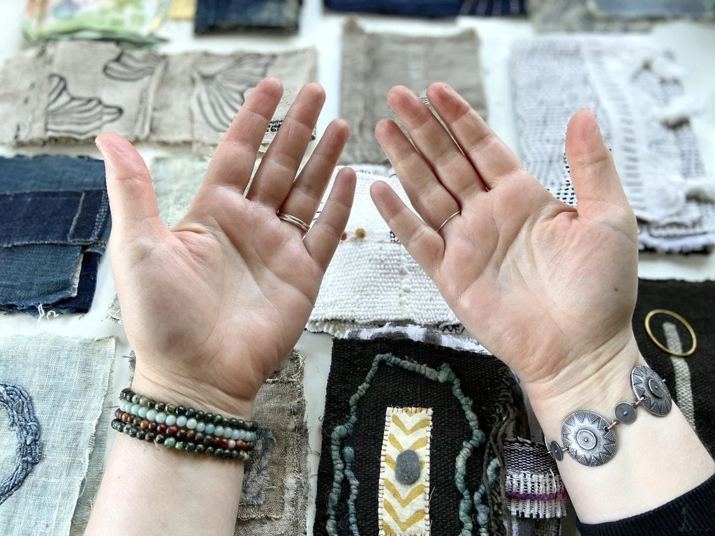 Rustic, contemplative mixed media textile books made by mixed media artist, Emma Freeman using vintage global textiles including mud cloth from Mali in Africa, batik fabric from India, vintage kantha cloth from India, wool yarn from a Peruvian frazad