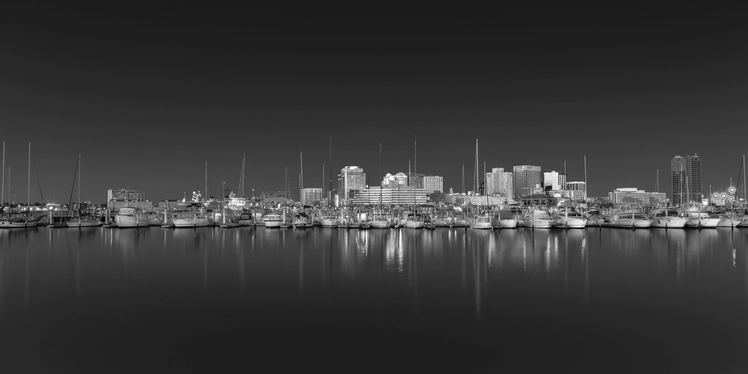 Norfolk Skyline With Boat Reflections In B&W