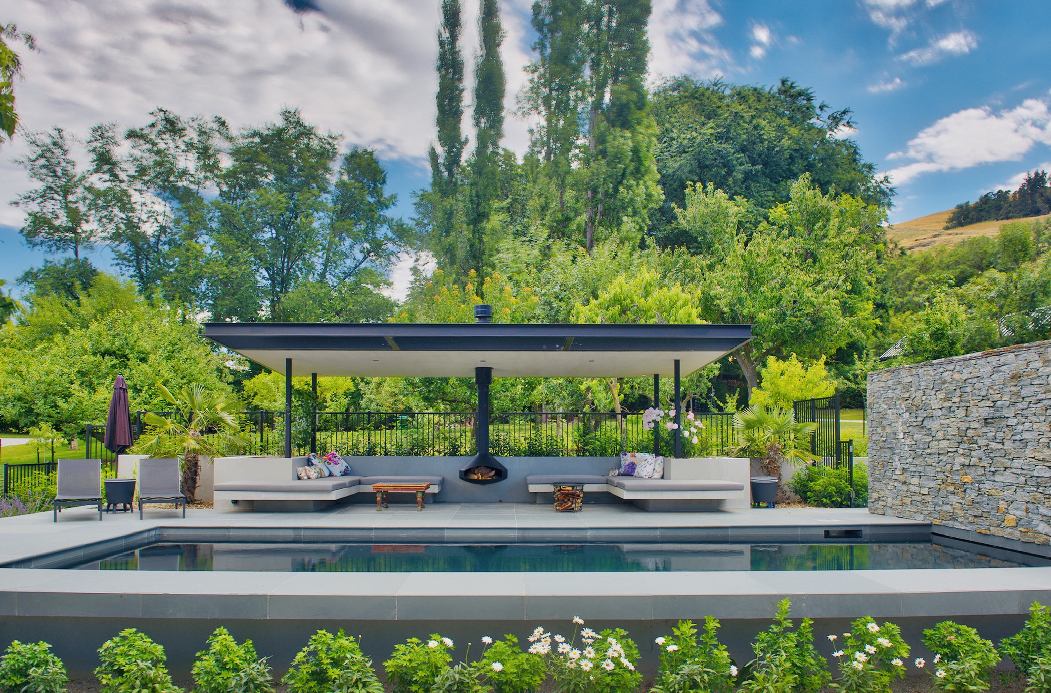 The pool canopy area offers shade and shelter