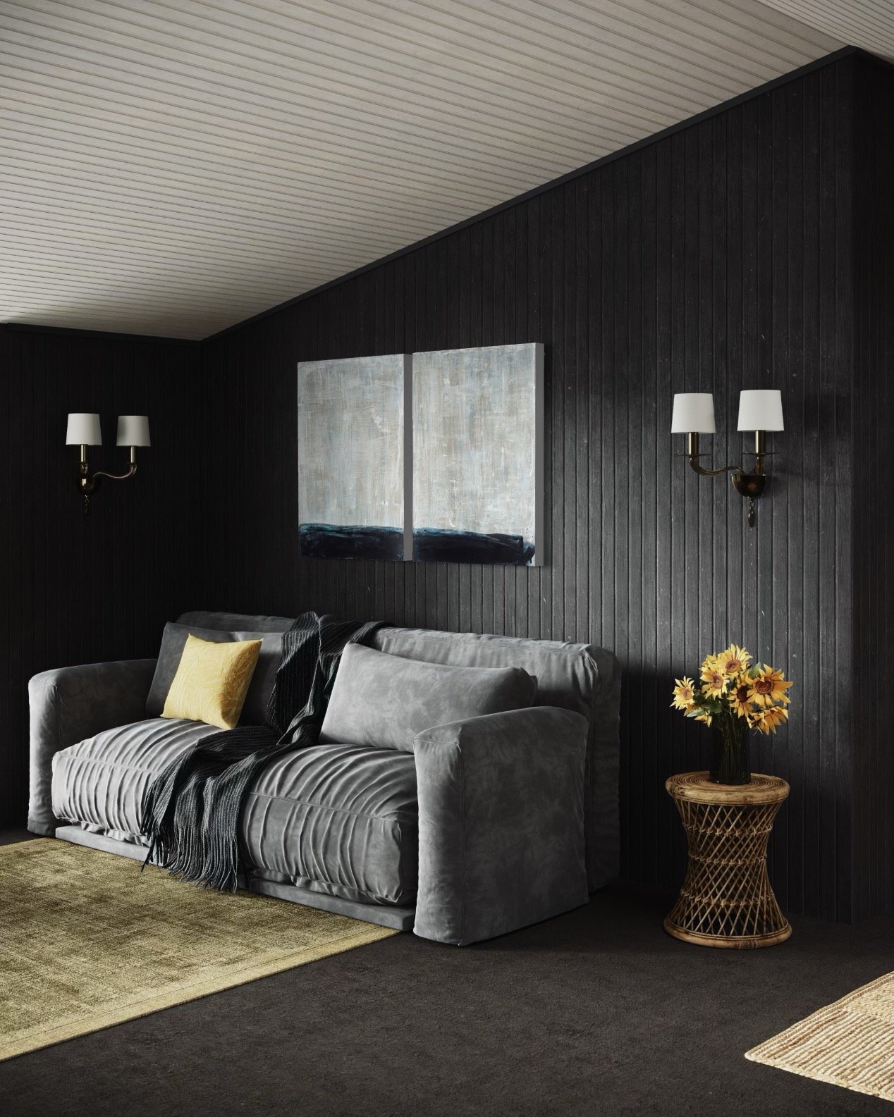 Side angle view of artwork by artist Jade Terry in a Dark moody interior space displaying large monochrome statement art by artist Jade Terry on a. dark wall