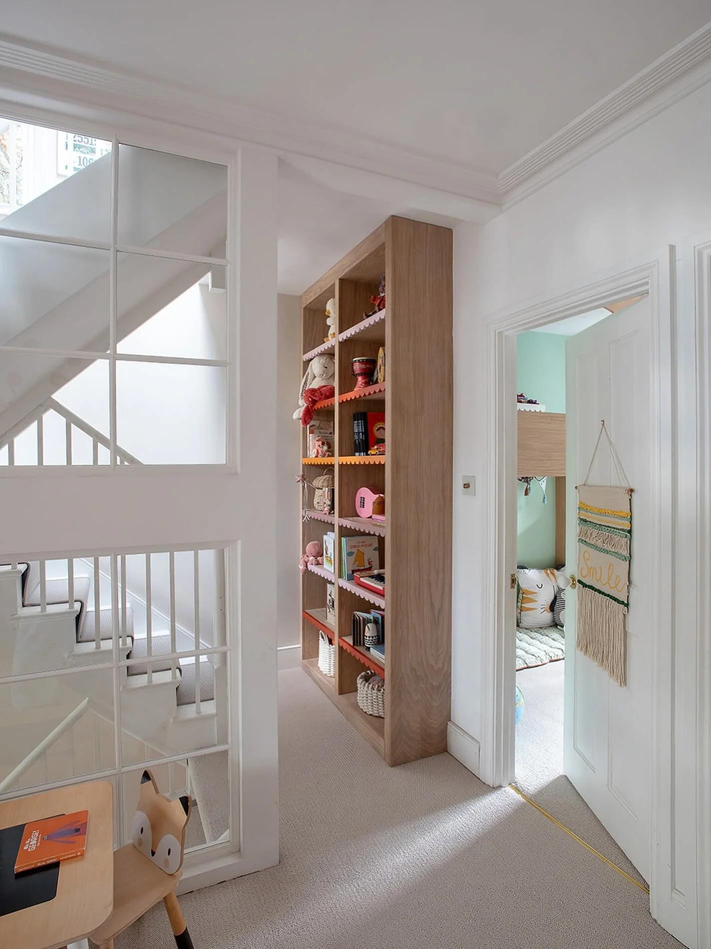 On the kids&rsquo; floor of my Islington project, this shared play space sits between the bedrooms and feels light filled, soft and joyful.

The brief was to build in plenty of storage while still keeping the space fun for the children to move throug