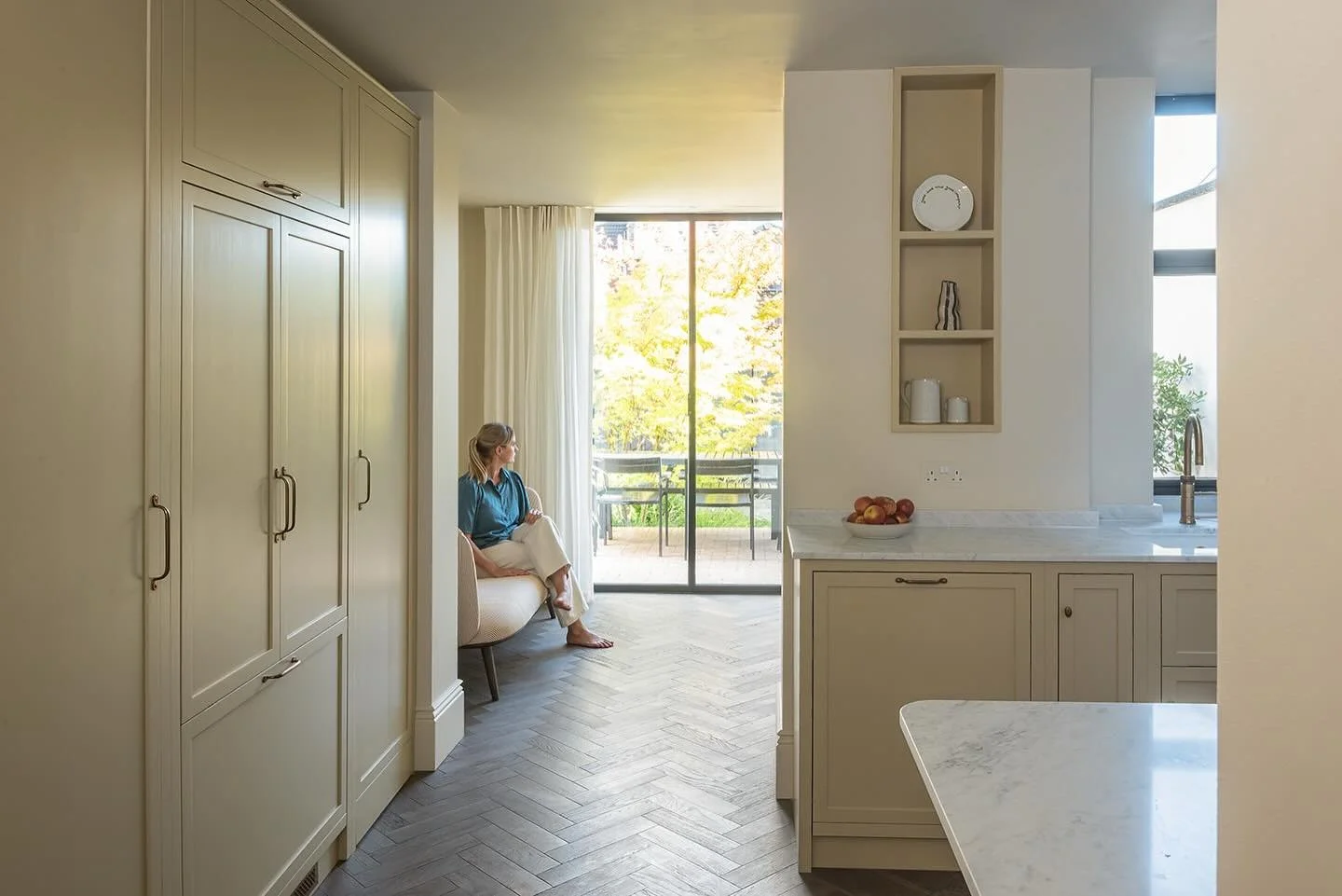 When you walk into the kitchen in my Leyton project, it&rsquo;s the calm that hits you first. 

Everything you need is quietly built into that full height wall on the left. Floor to ceiling cupboards, designed in collaboration with @apronkitchens, ho