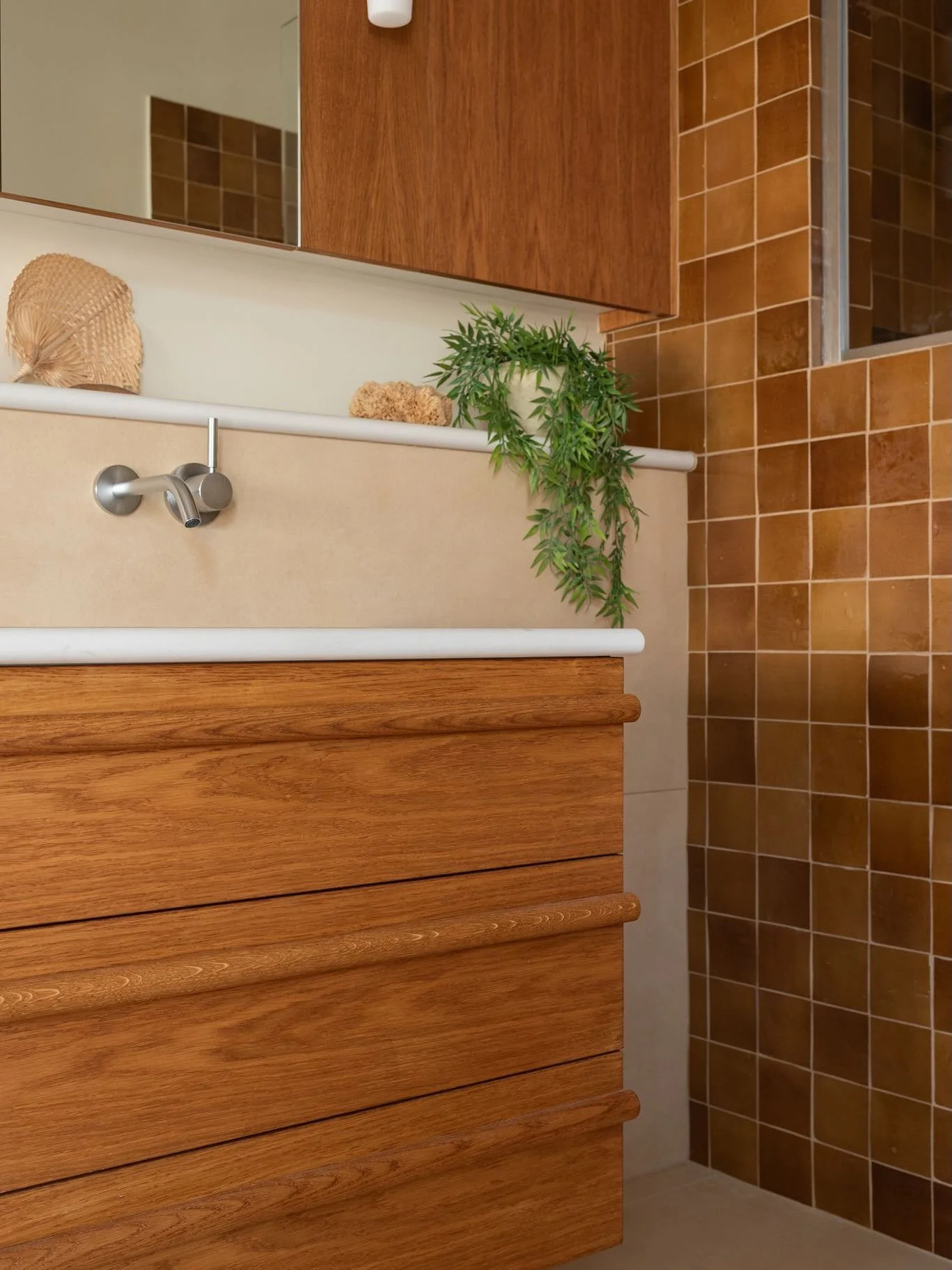 Bespoke joinery lets you turn something purely practical into something truly beautiful 🤎.

The vanity was always going to work hard in this bathroom, so rather than treating it as something that simply needed to blend in, I wanted the joinery to be
