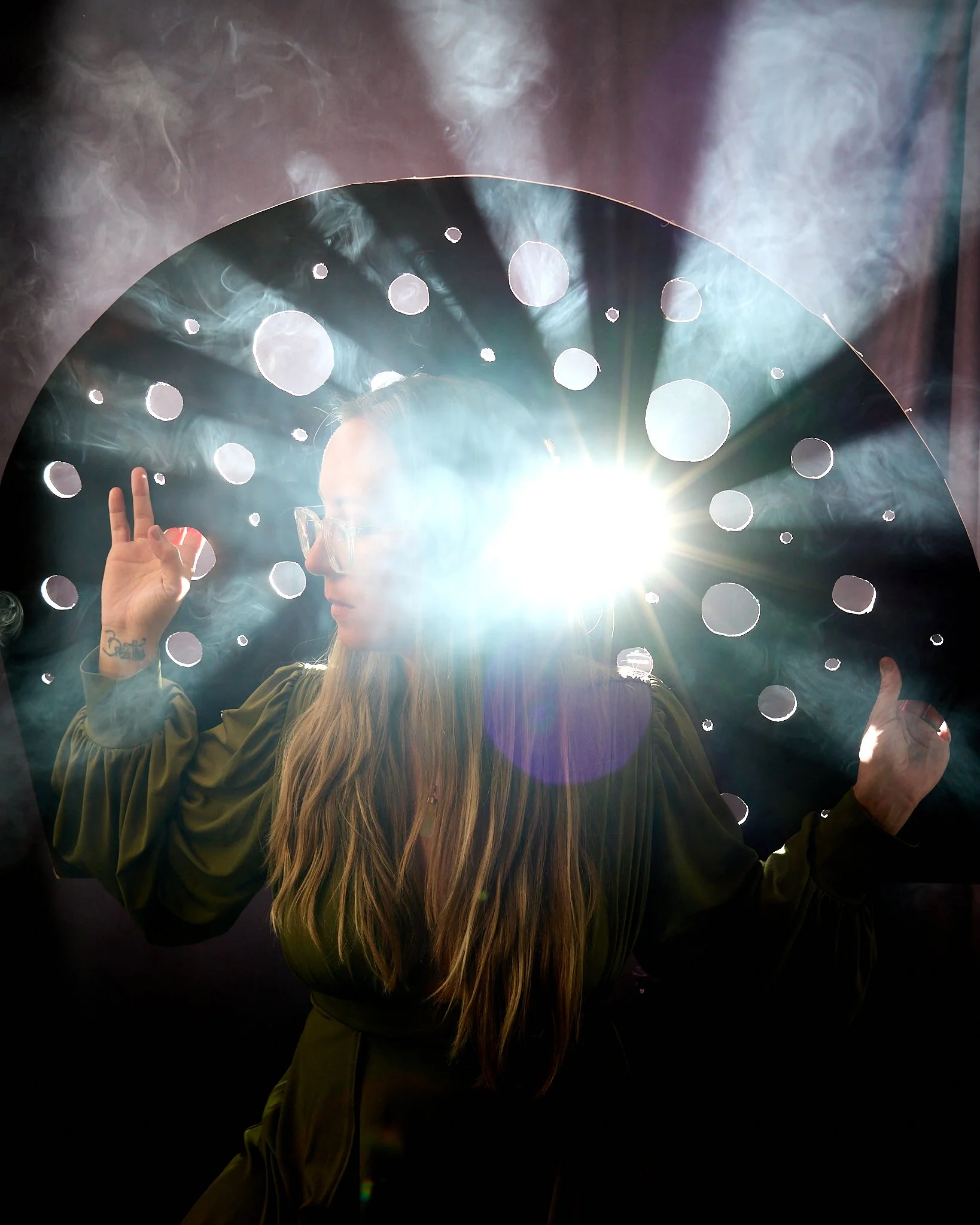 3. Light brings interest and intrigue. Bending, shaping, and enhancing light brings so much interest to a scene. Playing with fog and a creatively punctured board, the light rays add a layer of curiosity. 