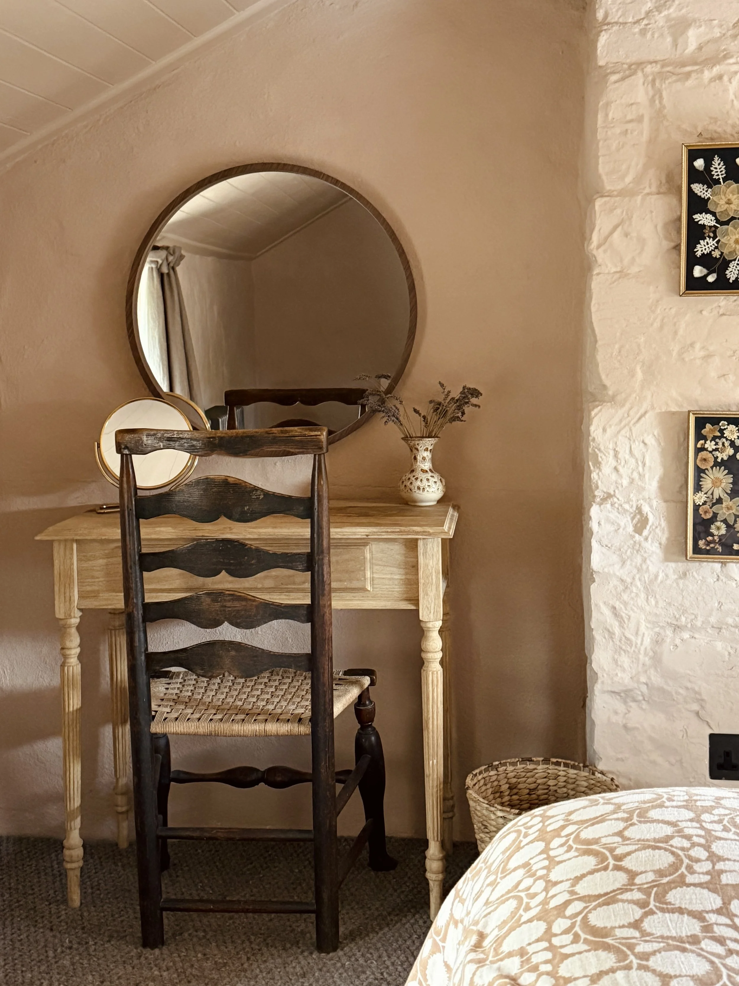 Beautiful romantic bedroom for two adults at luxury holiday cottage The Dorset Nook. With fine linens and antique furniture, stylish and cosy interiors. 