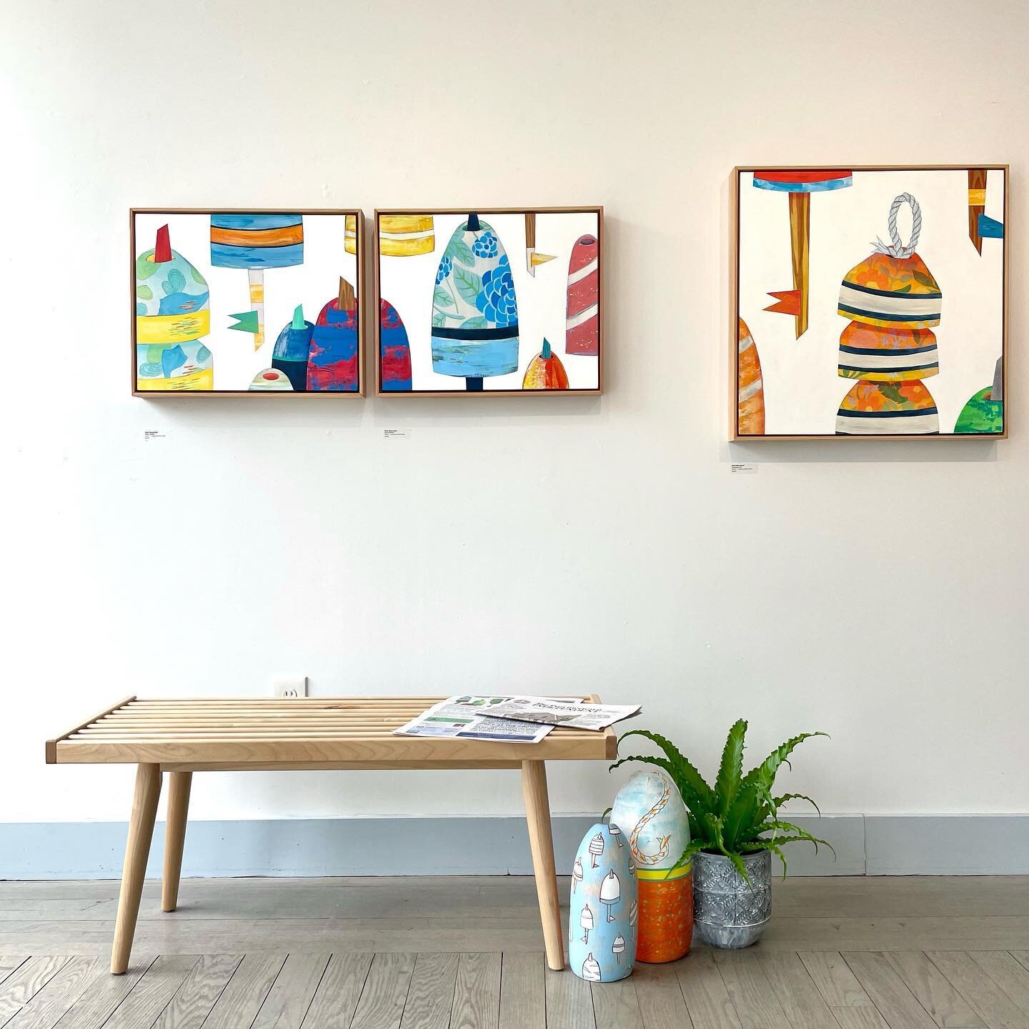 Look at how nice all of this work looks together. Quintessentially coastal! 2D paintings, and 3D Wall Buoys seen here as floor pieces. And they&rsquo;re great as an accessory on bookshelves too!

Every piece in this photo is available. Swipe to see i