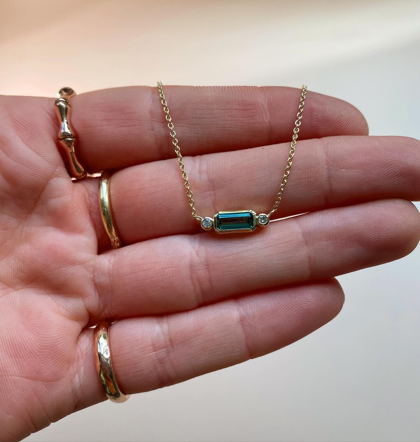 Lagoon pendant 😍

This 9k recycled gold pendant features a stunning teal tourmaline (hence its name), with two @oceandiamonds_ either side. 🌊 

Available to shop now on the website. 💙 

#jewelry #tourmaline #pendant #gold #goldpendant #necklace #g