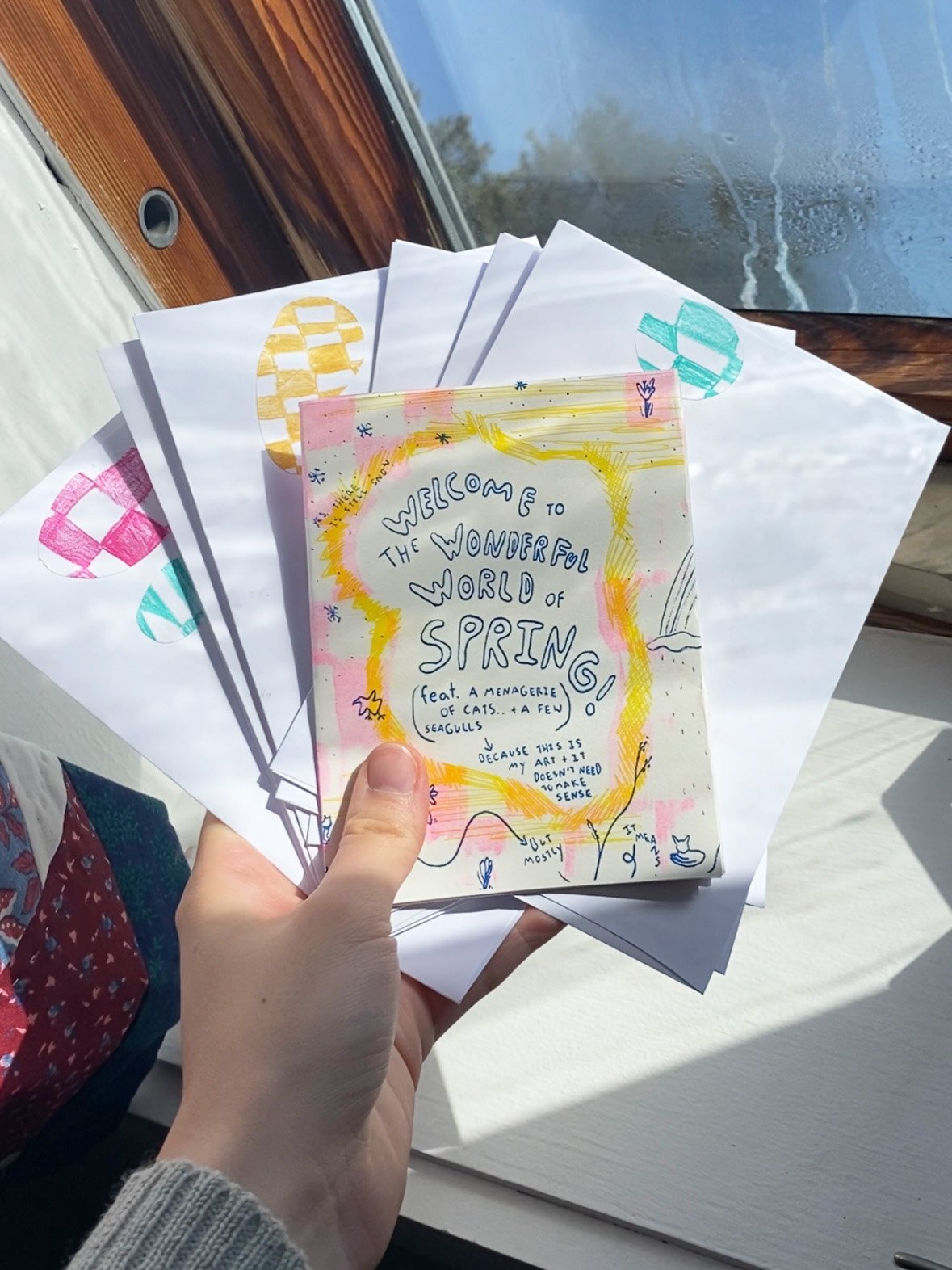 Once they were done I packaged them up and sent them off to my family. I decorated the envelopes with some hand colored stickers that matched the zine's background.